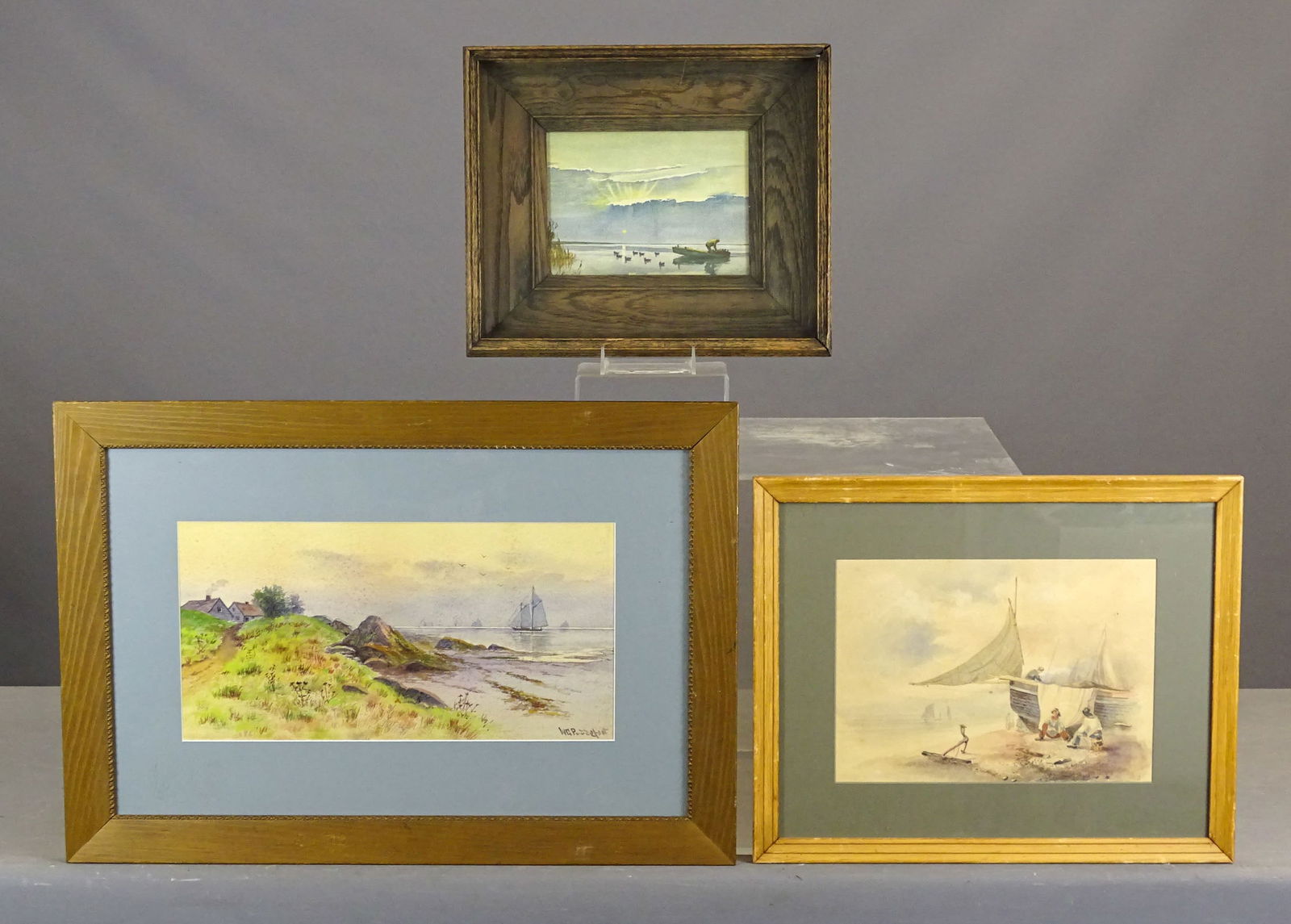 Artwork Lot: Artwork lot including: Seascape, watercolor, unsigned (overall in frame 16 1/2" x 20"), Seascape, watercolor, signed LRC (overall in frame 19" x 27 1/2"), watercolor, fisherman in lake (overall in
