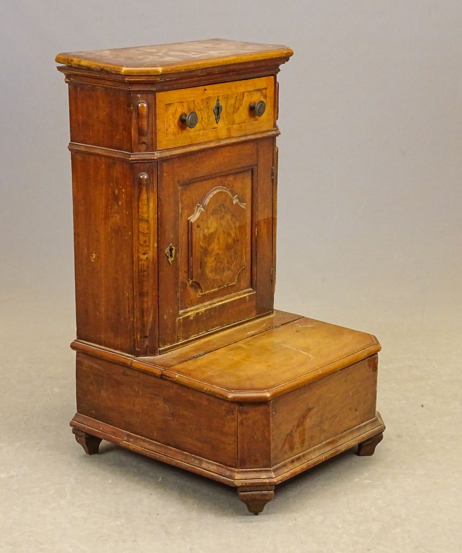 18th c. Continental Cabinet: 18th c. Continental cabinet. Single drawer over door with stepped out lift compartment. One foot detached and needs repair. 18" x 20" x 33" Ht..