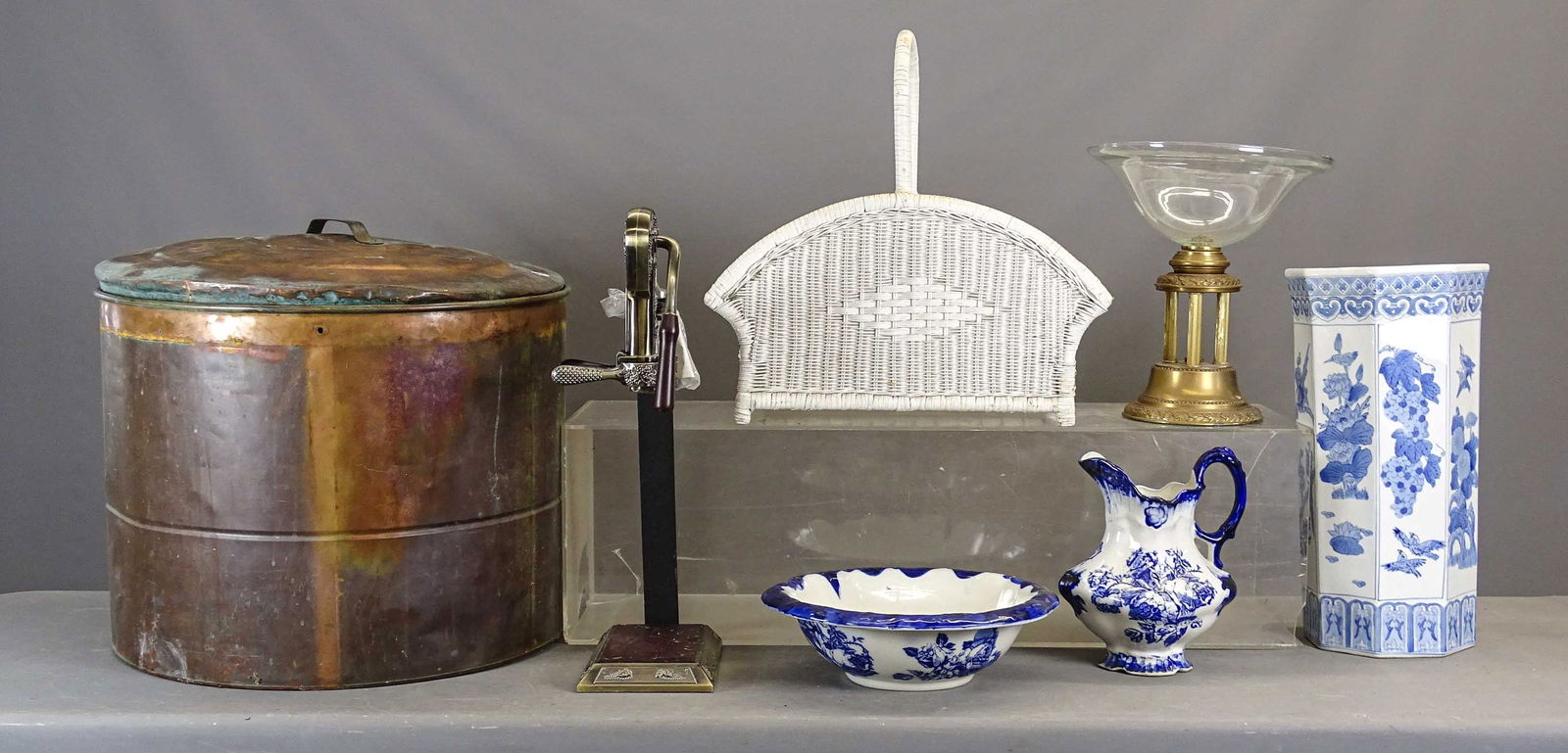 Misc. Lot: Lot including: Large copper bucket (23" D., 19" Ht.), wicker magazine rack (23" x 11" x 18"), ceramic umbrella holder (10" D., 20 1/2" Ht.), wine bottle opener (23" Ht.), ironstone blue and white