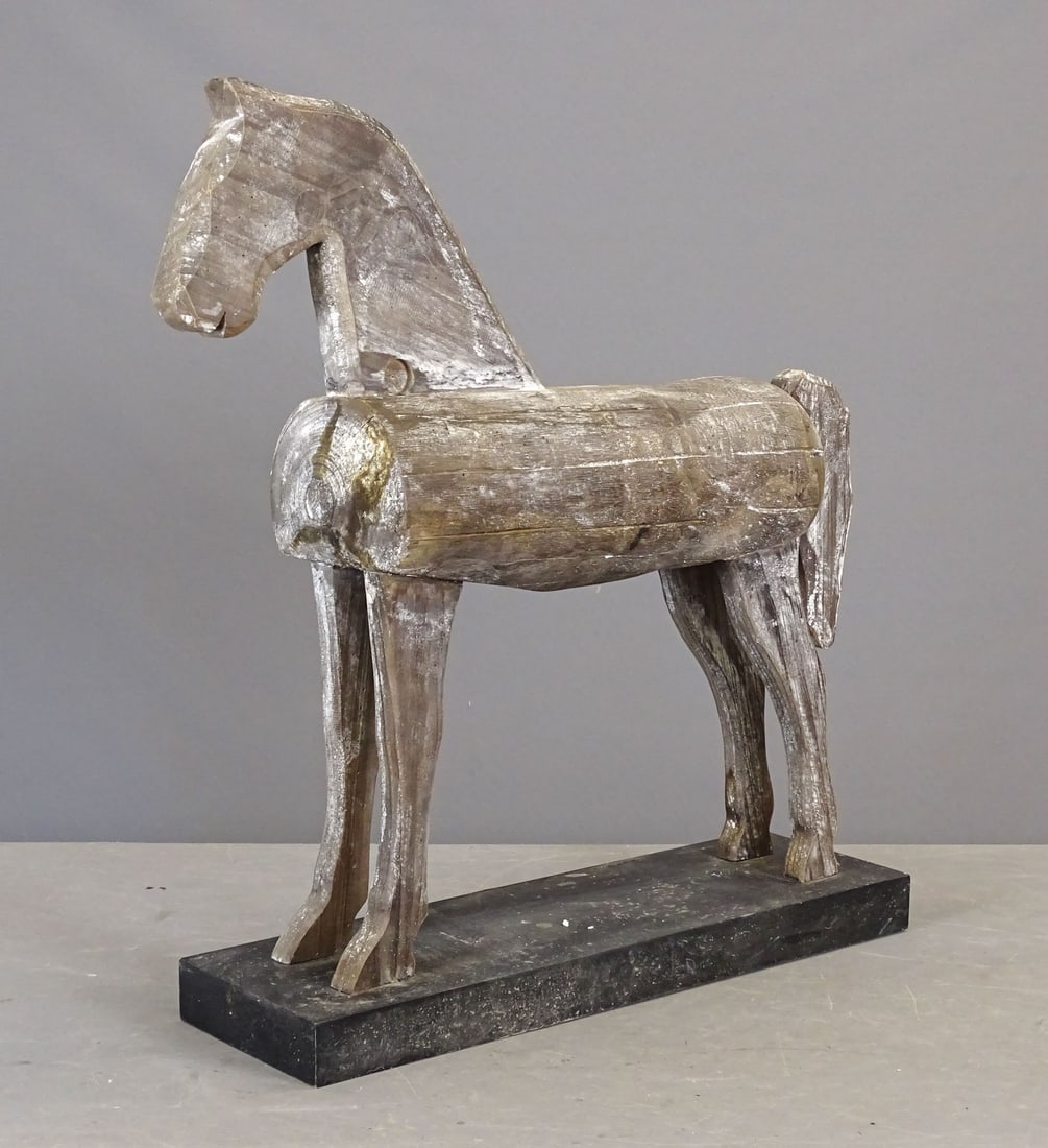 Carved Wooden Horse: Carved wooden horse on base. 27" x 7" x 28" Ht..