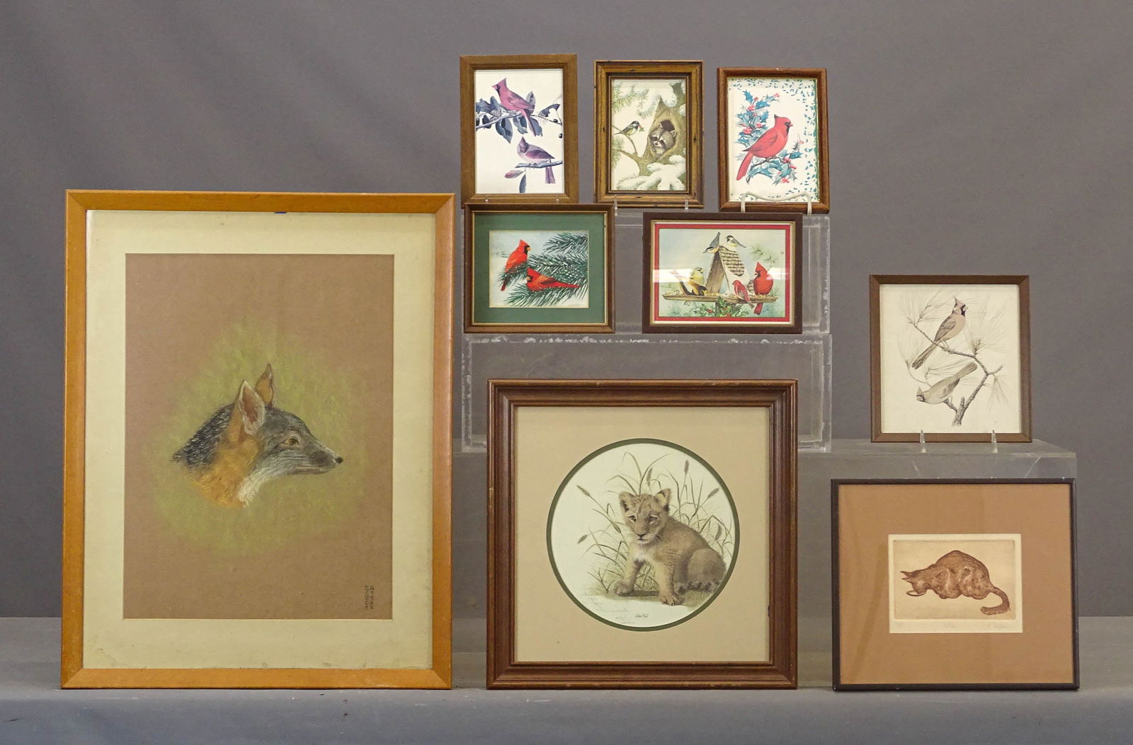 Artwork Lot: Artwork lot including: Original fox pastel signed "Joyce Attee" (overall 25" x 19 1/2"), etching of cat signed "K. Stephan" (overall 10 1/2" x 12"), signed print "Lion Cub" (overall 15 1/2" x 15 1/2")