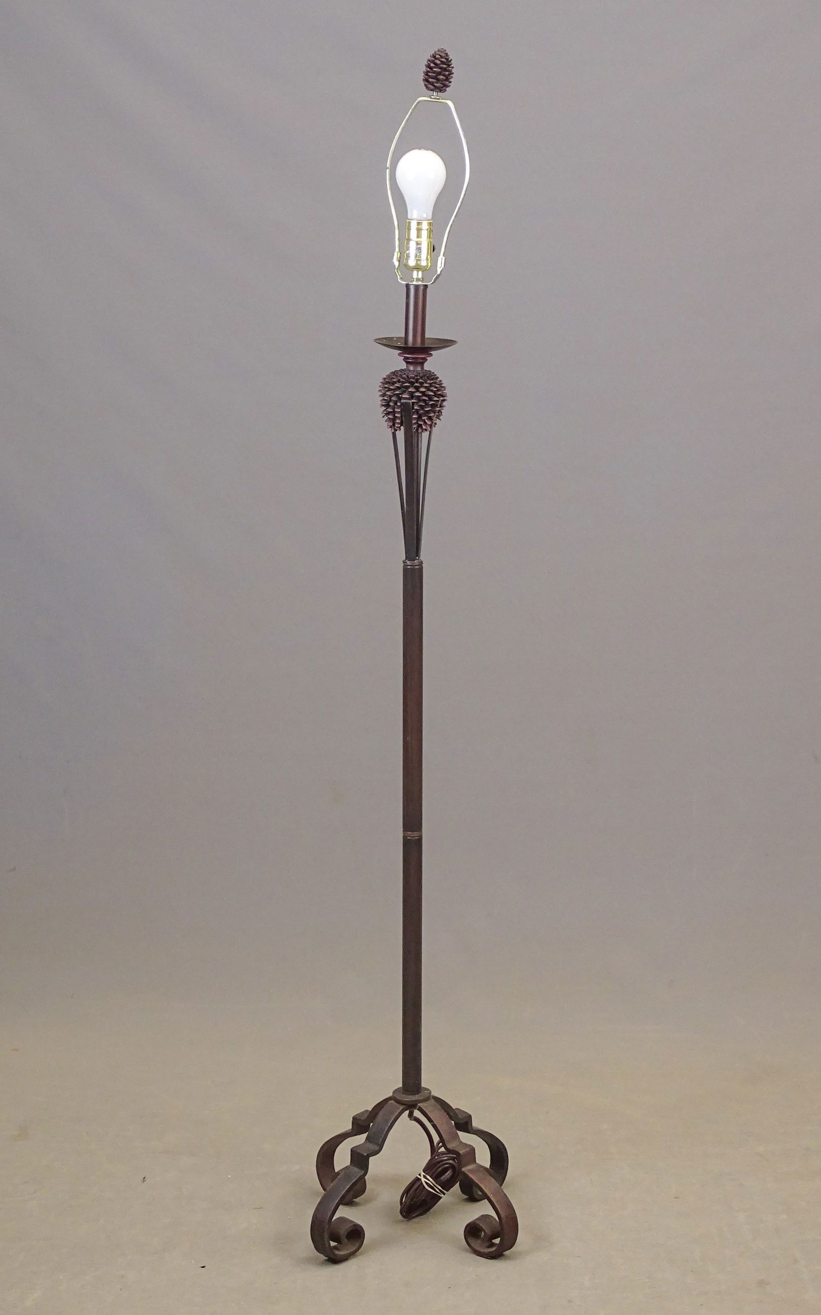 Floor Lamp: Floor lamp with pinecone decoration. No shade. 59" Ht..