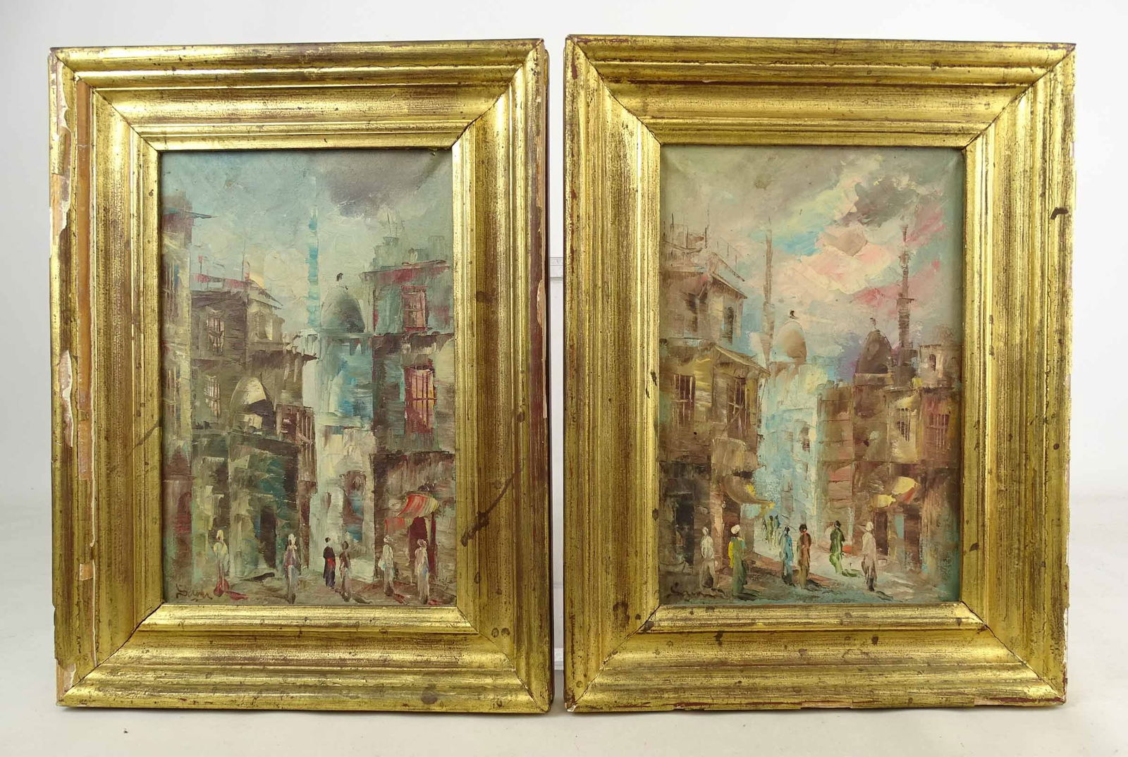 Pair Arabic School Paintings: Painting: Pair of Arabic School street scenes. Oil on canvas. Overall in frames. 16" x 12".