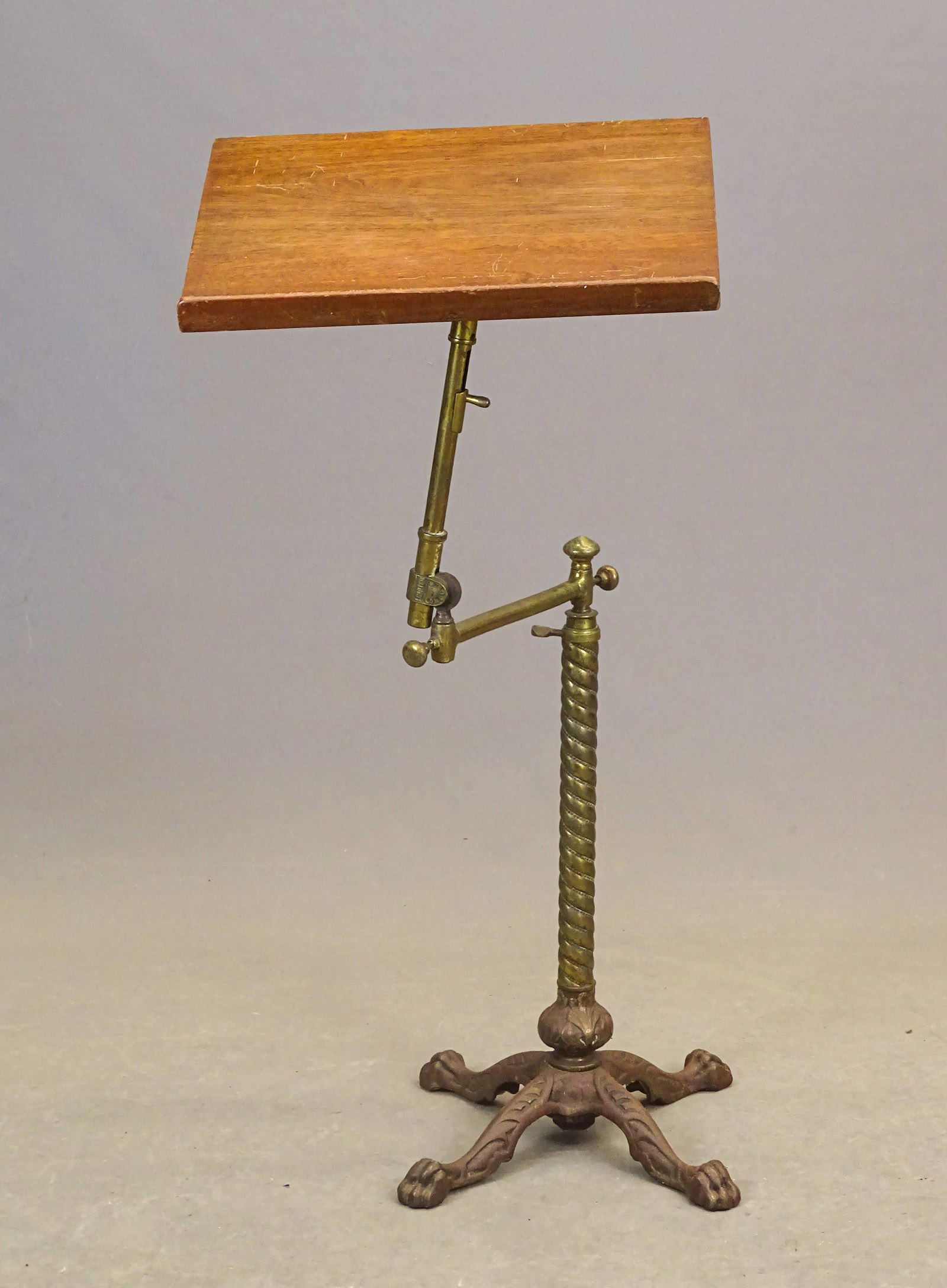 Music Stand: Early brass and wood writing stand. 18" W., 44" Ht..
