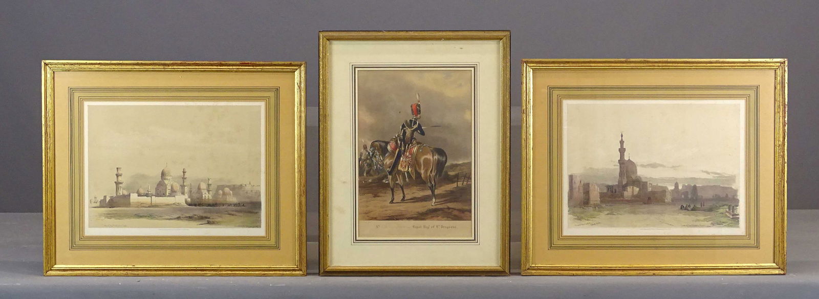 Artwork Lot: Artwork lot including: "The Prince of Wales Own, ROYAL REG.' OF W. DRAGOONS" (overall 19" x 15"), pair English Mosque antique prints (overall 17" x 21").