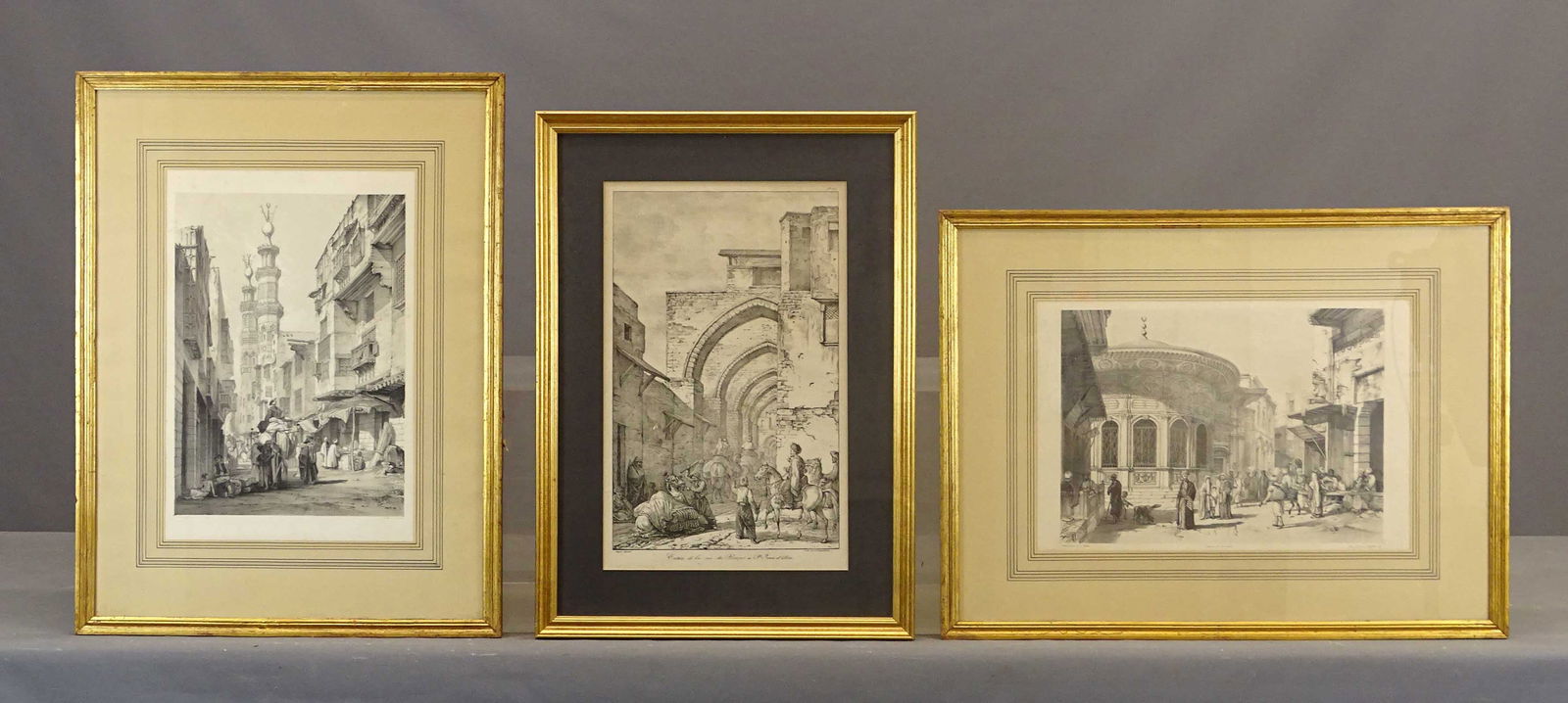 Artwork Lot: Artwork lot including: Egyptian print (Drawn on Stone by J.C. Bourne, overall 20 1/2" x 27"), Egyptian etching (Carle Vernet, overall 25" x 18"), Egyptian street scene print (overall 27" x 20 1/2").