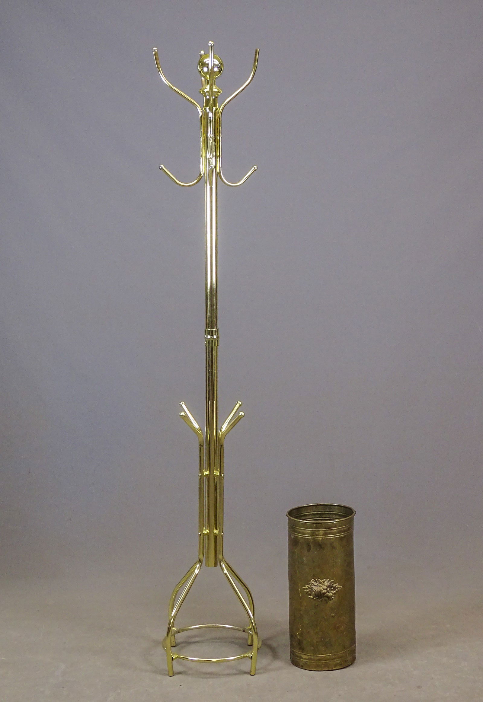 Brass Hat Rack Lot: Lot including brass hat stand (74" Ht., plastic finial), and brass umbrella stand (8" D., 18" Ht.).