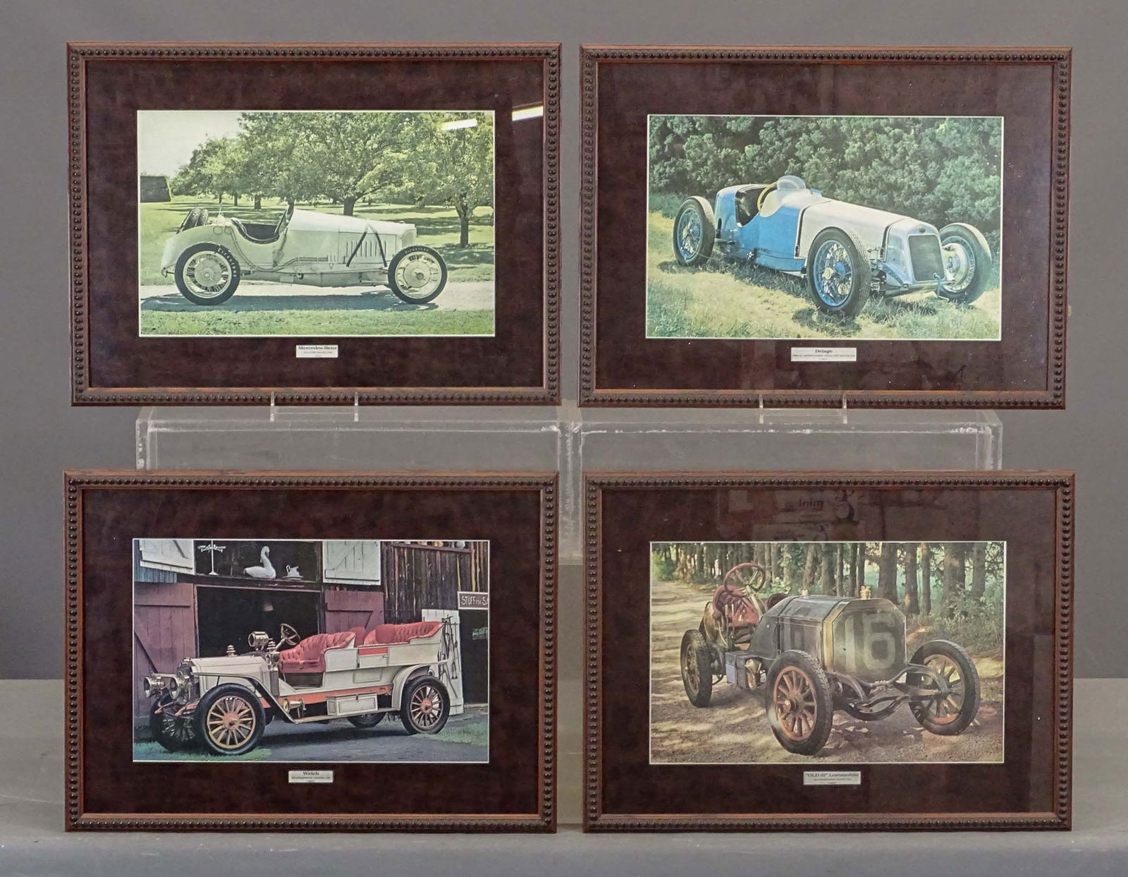 Pair Automobile Photo Prints: Four automobile photo prints. Delage and Mercedes-Benz, Welch, Old 16, Locomobile. Overall in frames 16" x 21".