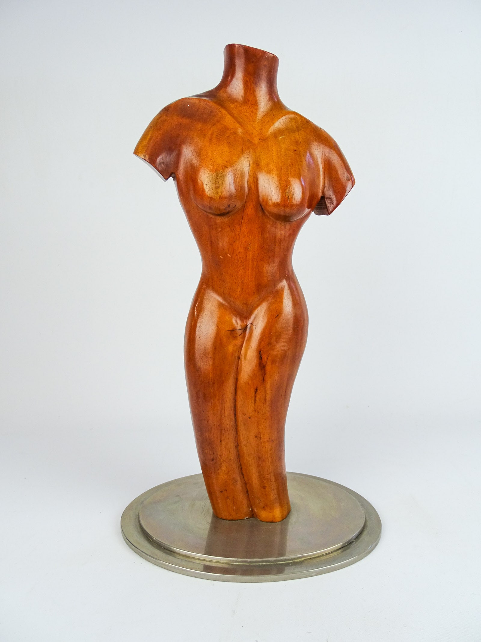 Franze Hagenauer (1906-1986): Franze Hagenauer (1906-1986): Wooden Torso sculpture with metal oval base. 17" Ht.. Base marked "…WERKS HAGENAUER WIEN AUSTRIA…".
