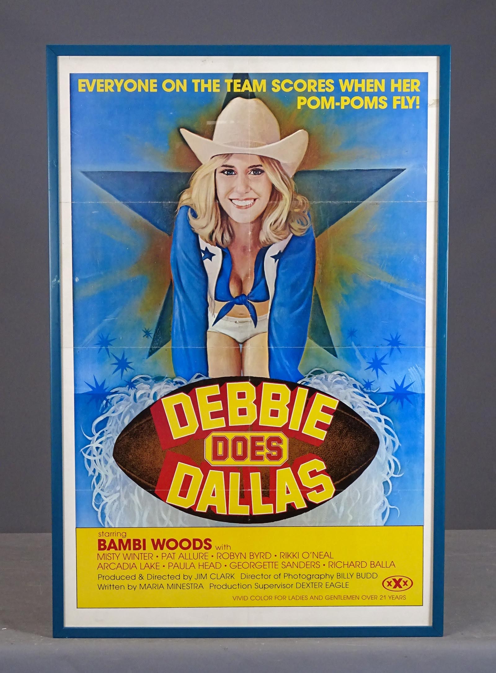 Vintage Poster: "DEBBIE DOES DALLAS": Vintage poster: "DEBBIE DOES DALLAS" (Starring Bambi Woods). Overall in frame 39" x 26".