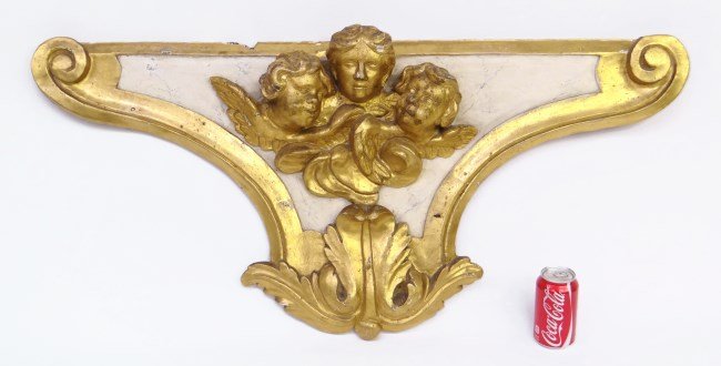 Architectural Carving: Continental Architectural carved and gilt element with three heads. 43" x 20".