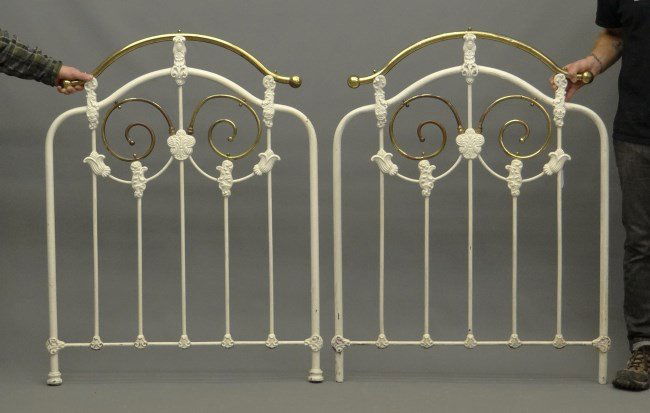 Pair of Brass and Iron Headboards: C. 1900 pair of brass and iron headboards (no siderails). 35" W x 46" Ht.