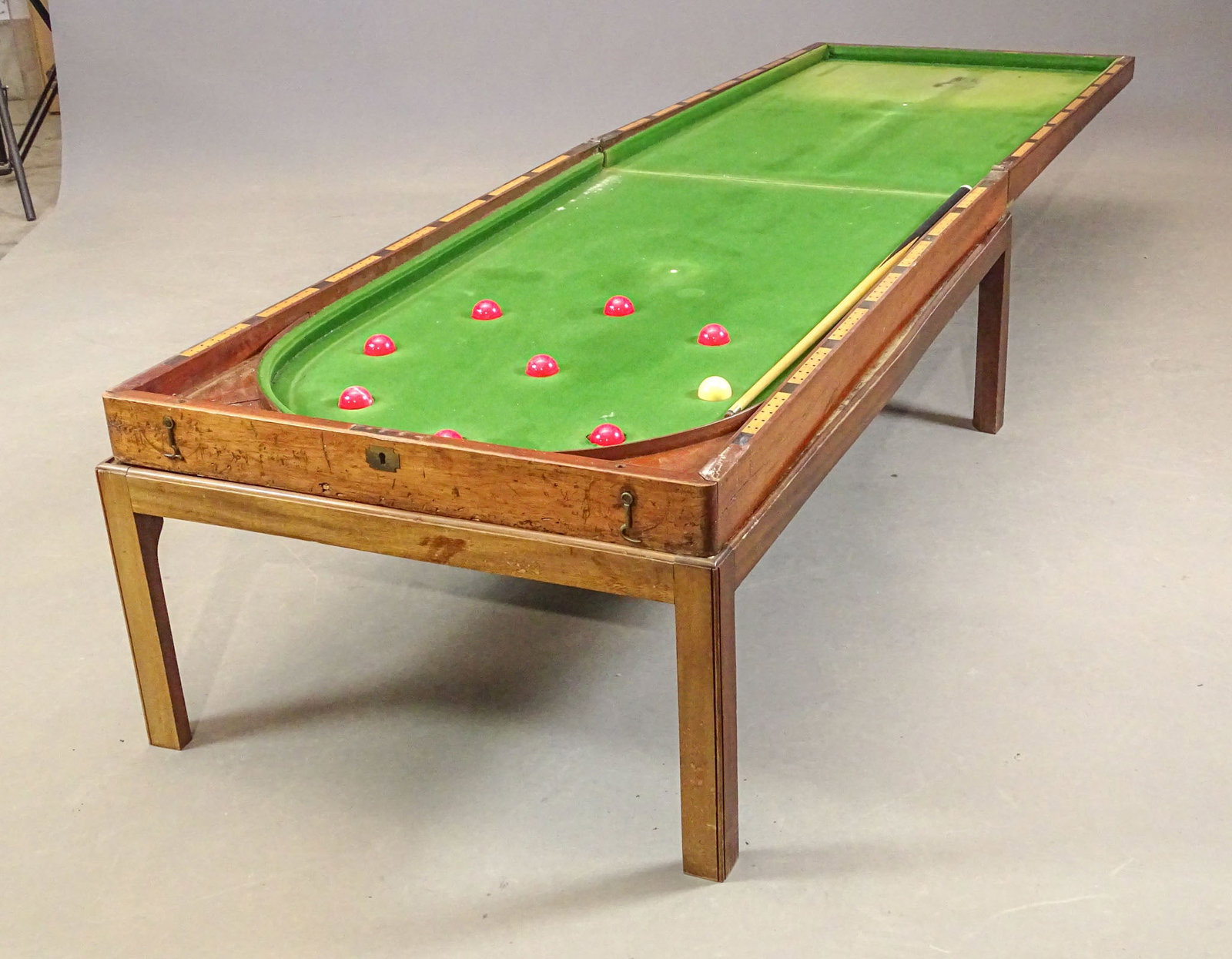 19th c. English Bagatelle Table: 19th c. English fold-away English Bagatelle table. 28" x 48" x 19" (closed), 8' L. open.