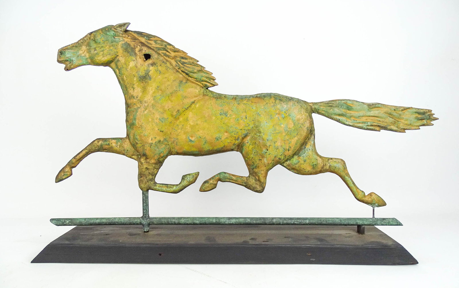Horse Weathervane: Running horse Smuggler type weathervane. Wooden base included. 33" x 17".
