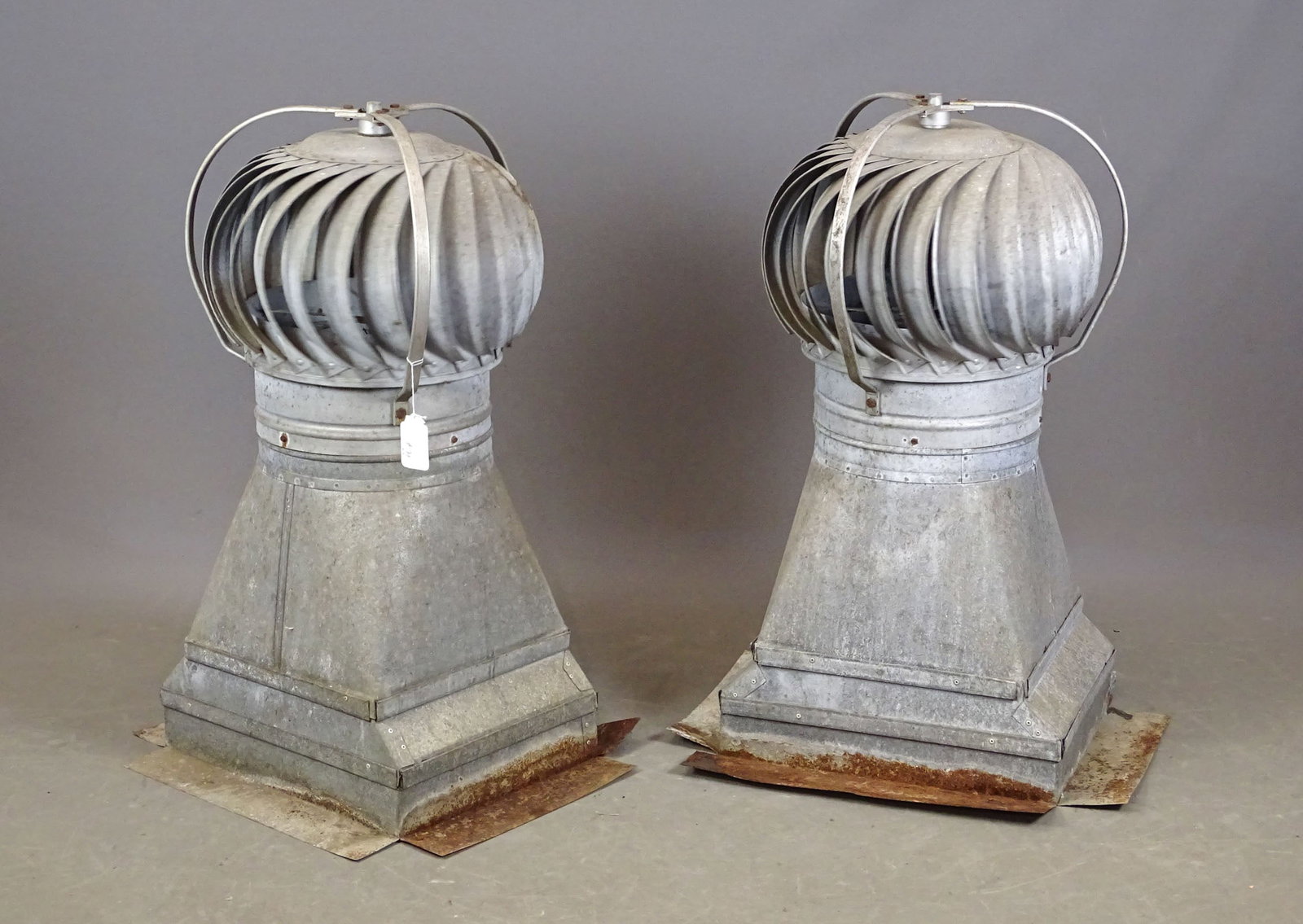 Two Metal Chimney Ventilators: Lot (2) metal barn chimney ventilators. 17" x 17" x 36" Ht..
