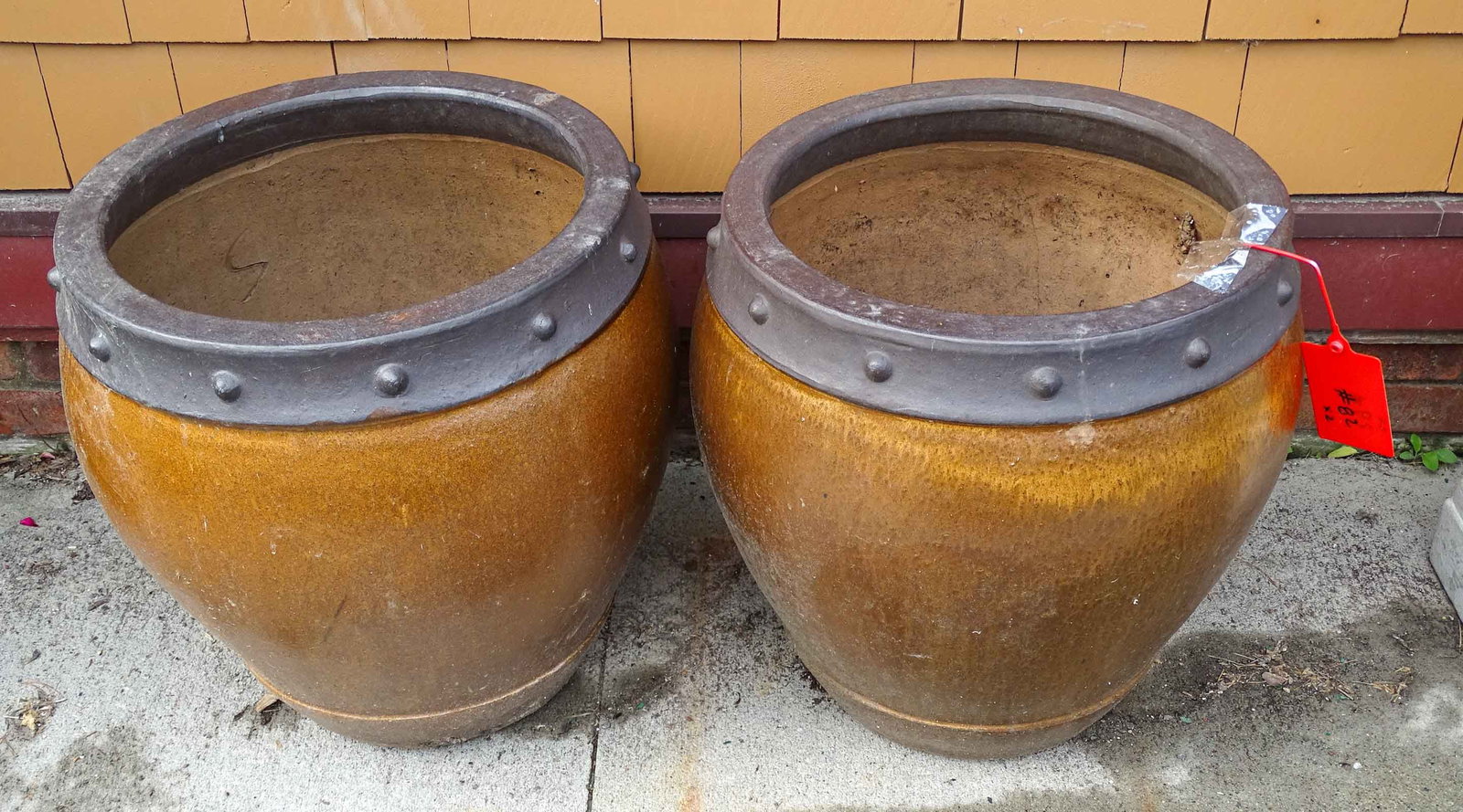Pair Pottery Planters: Pair of pottery planters. 17 1/2" D., 20" Ht..