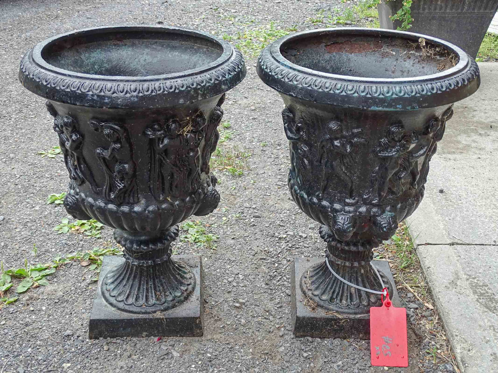 Pair Cast Iron Urns: Pair of cast iron urns. 14' D., 21" Ht..