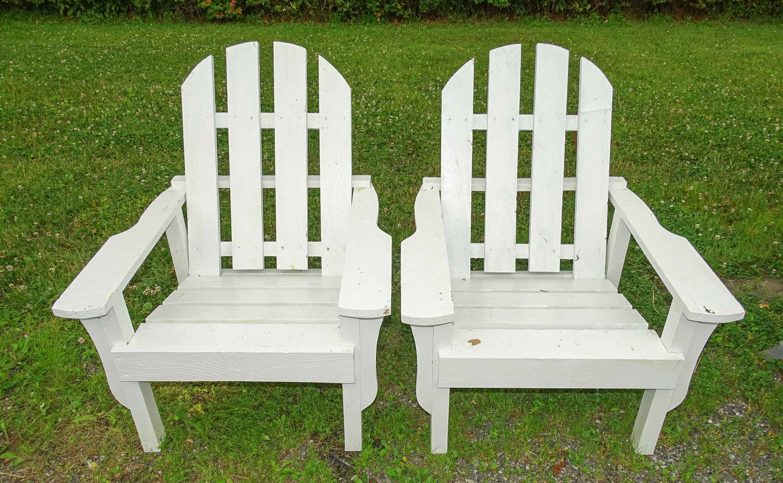 Pair of Adirondack Chairs: Pair of Adirondack chairs.