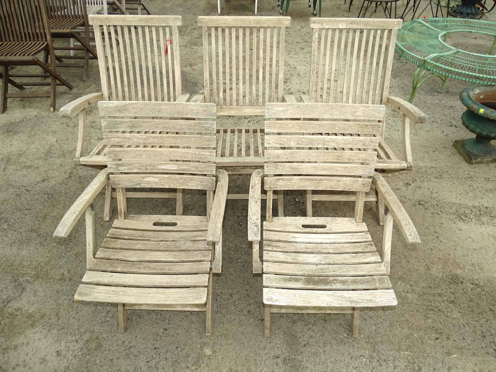 Set of Teak Chairs: Set of (5) mismatched teak chairs.
