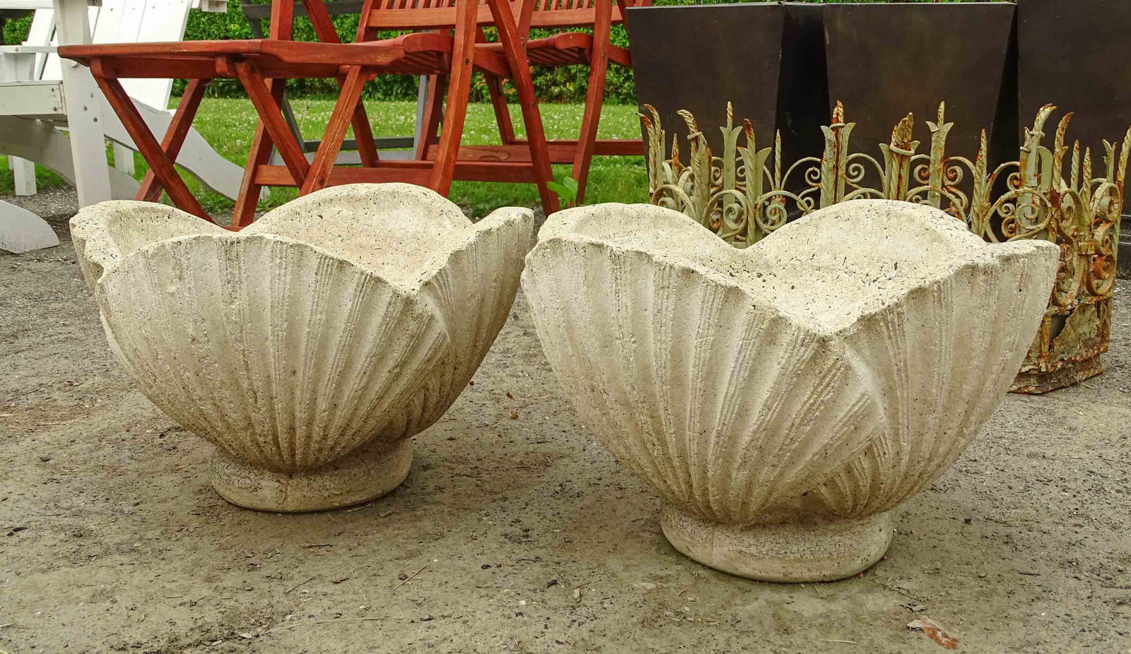 Pair Cast Stone Urns: Pair of cast stone urns. 16" D., 10 1/2" Ht..