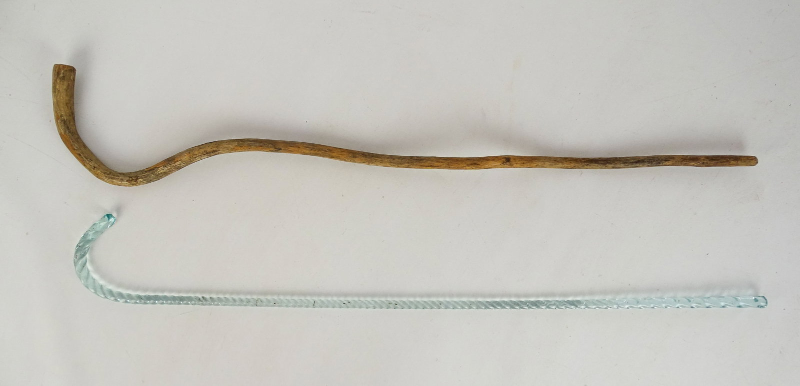 Cane Lot: Lot including: Wooden cane and early glass cane. Longest 30" L..