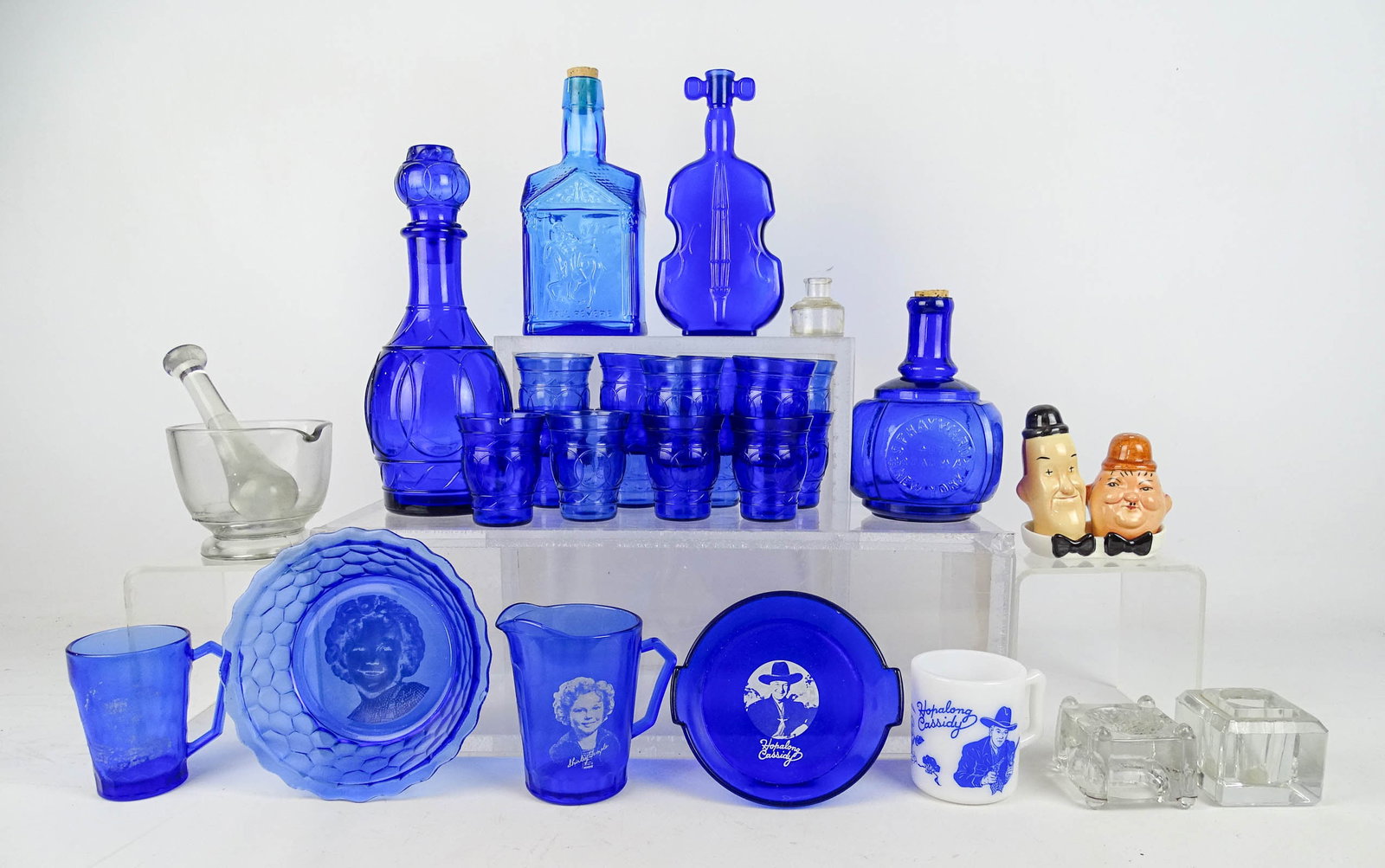Misc. Lot: Lot including: Cobalt glass (Shirley Temple, Hop-a-Long Cassidy etc., decanter with (4) glasses etc.), Paul Revere decanter by Wheaton glass, Laurel & Hardy Salt and peppers etc..