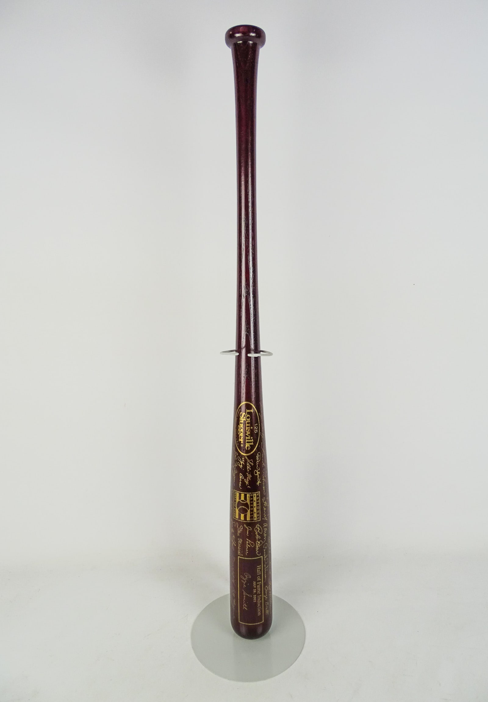 Autographed Baseball Bat: 2002 Hall of Fame autographed baseball bat including: Ozzie Smith…".