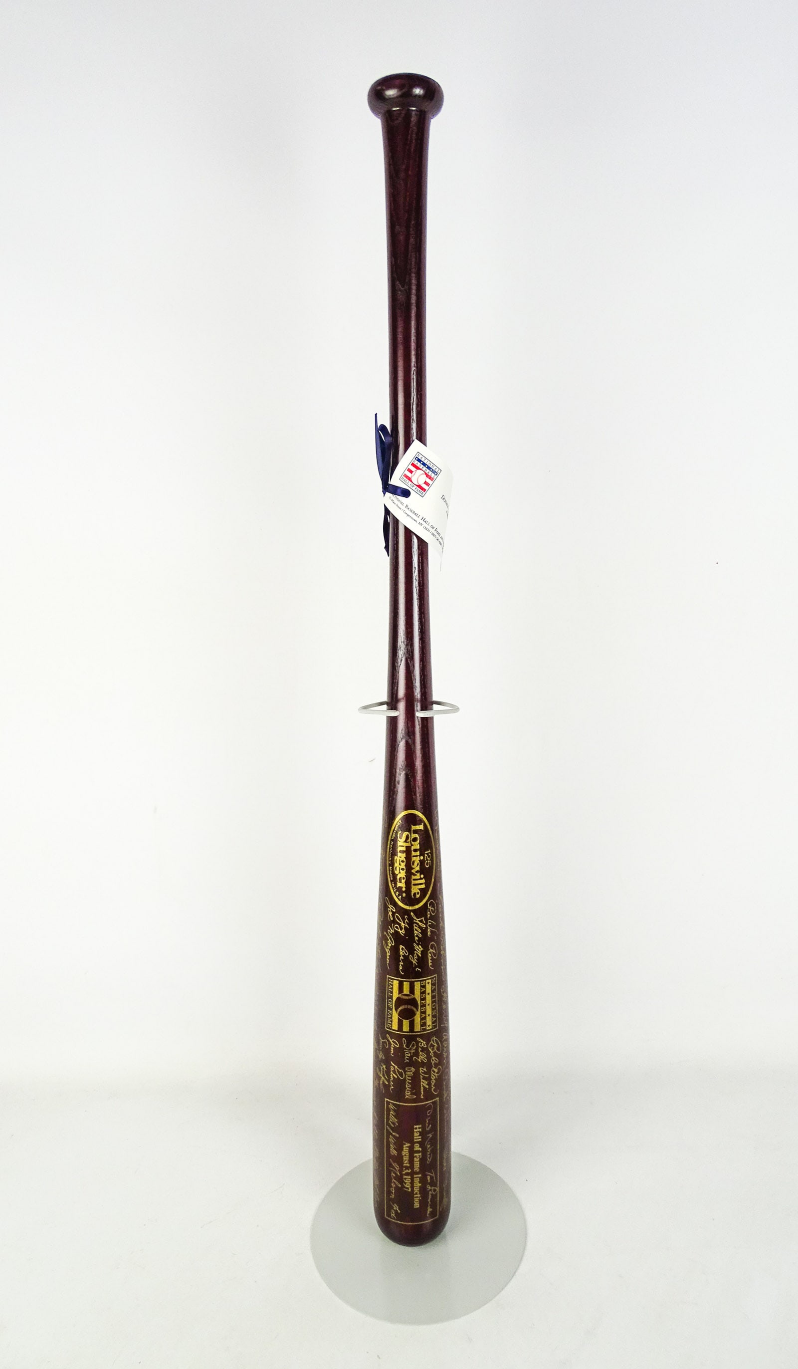 Autographed Baseball Bat: 1997 Hall of Fame autographed baseball bat including: Nellie Fox, Tom Lasorda, Phil Niekro, Willi Wells…".
