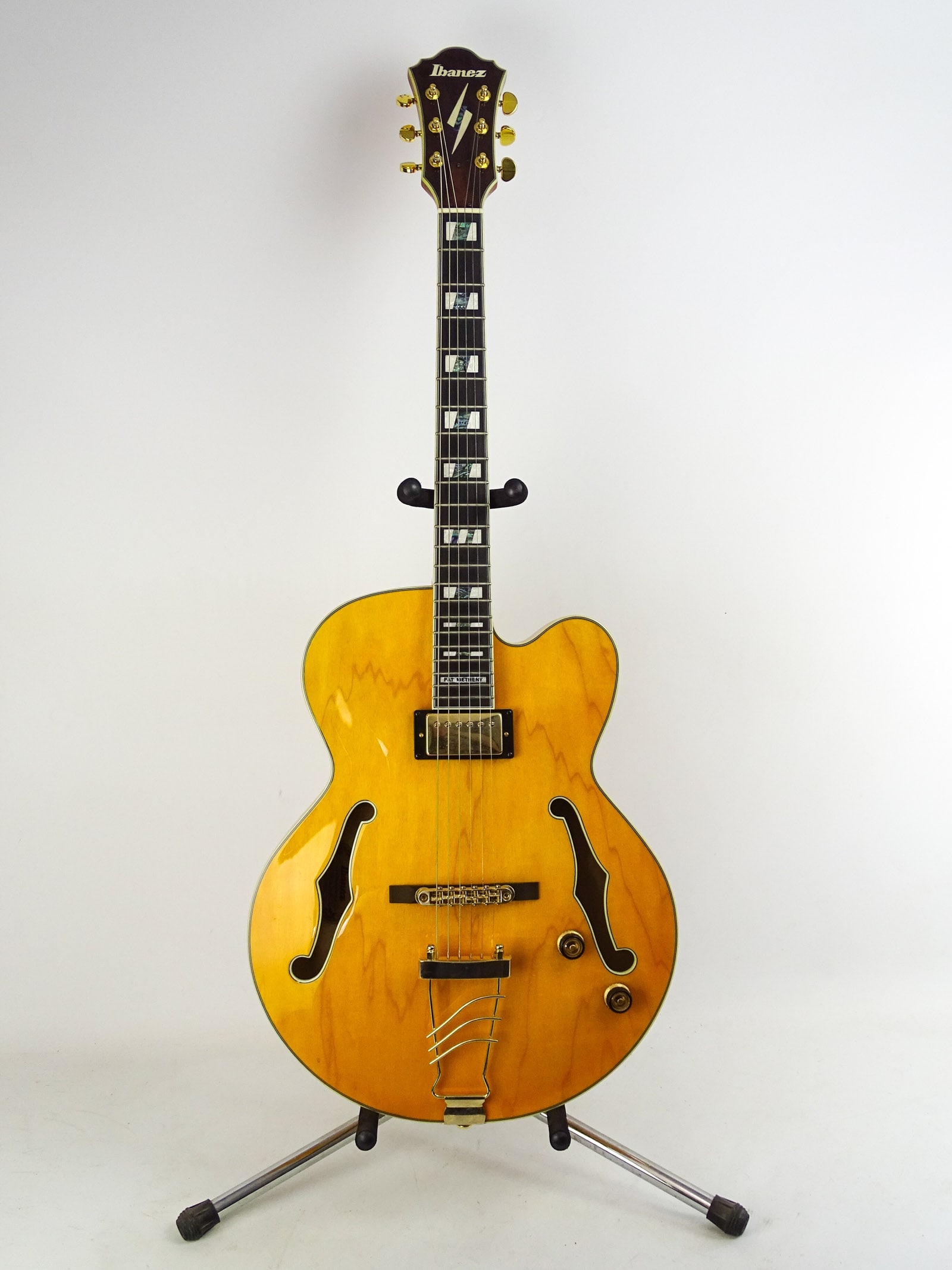 Ibanez Pat Metheny Model Guitar: Ibanez Pat Metheny model PM2-AA 5B-03 electric jazz guitar. Original hard shell case. Marked back of headstock "CE". Original manual. Barely played.