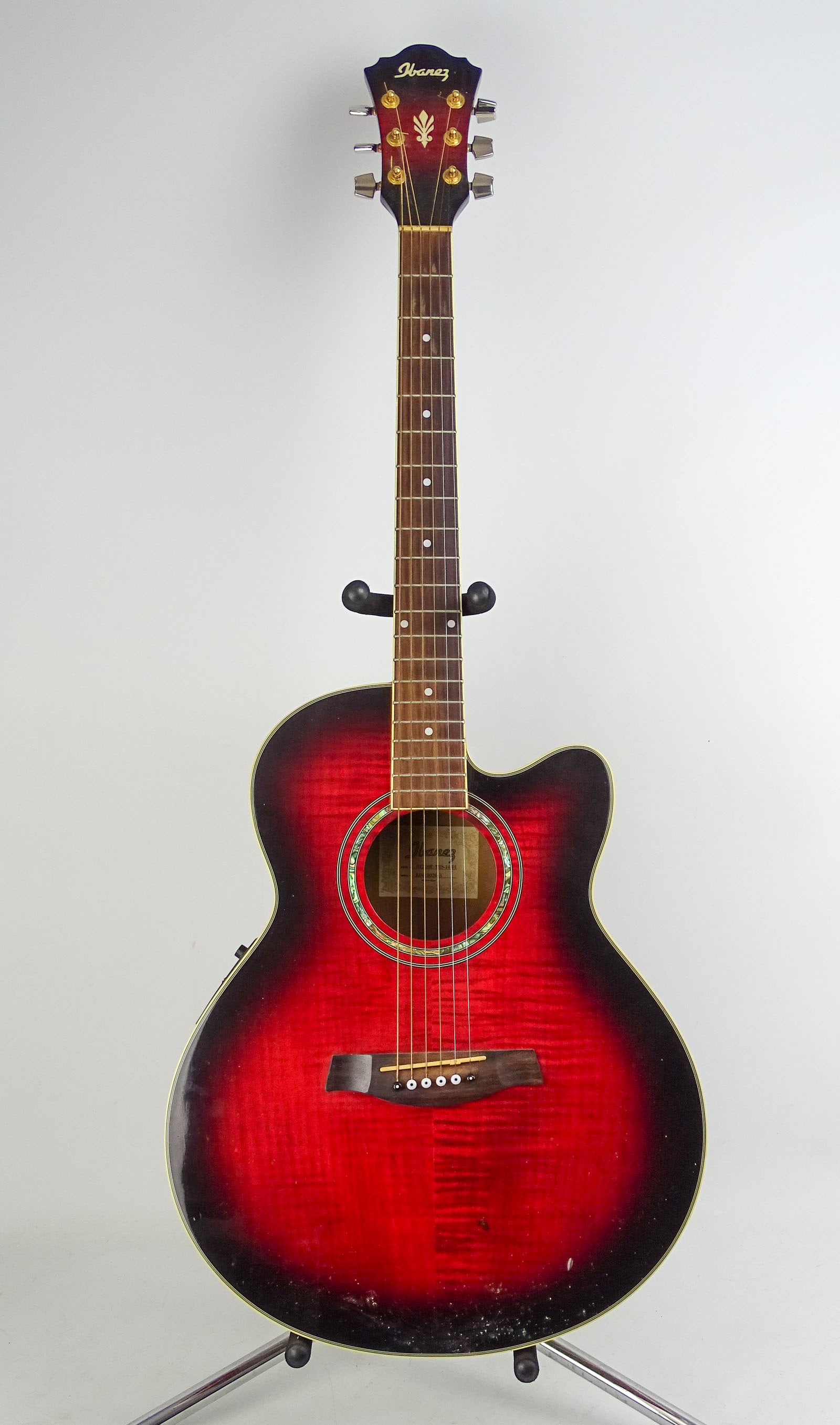 Ibanez Acoustic Guitar: Ibanez Acoustic Electric guitar. Model #AE20ETRS1401, SN#Ko41202843. Comes with gig bag. Made in China.