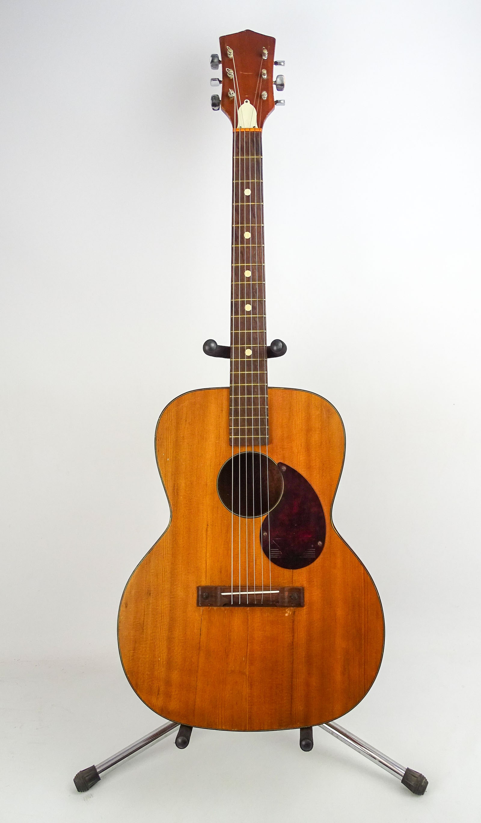Kay Acoustic Guitar: Kay acoustic guitar. C. 1950's, SN#L4263, with padded chip board case. 40" L..