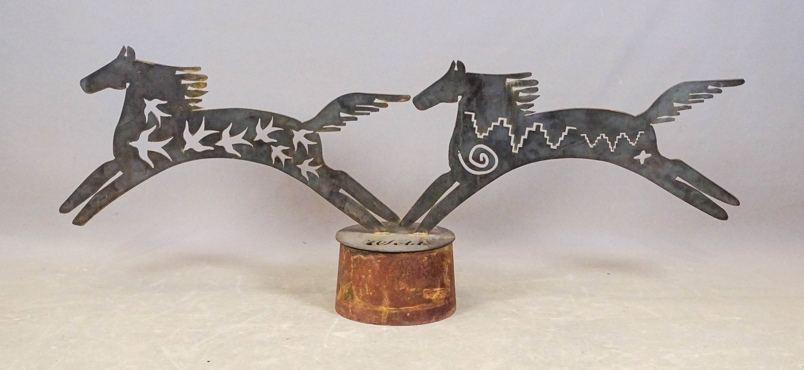 Metal Horse Sculpture: Large metal double horse sculpture. 64" W., 21" Ht.. Marked "WEBB".