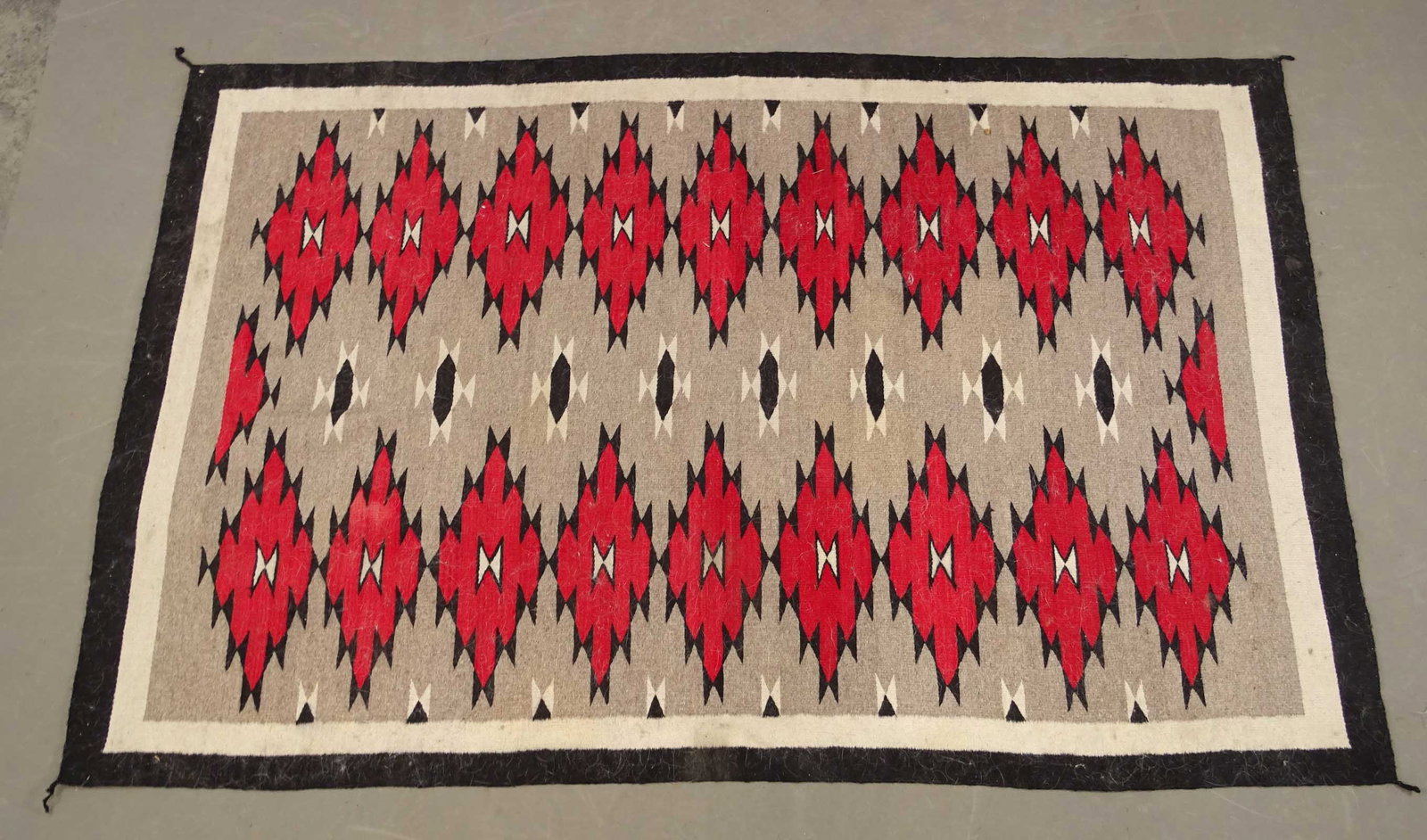 Navajo Rug: Navajo rug. 48" x 8852" x 82". Needs cleaning.