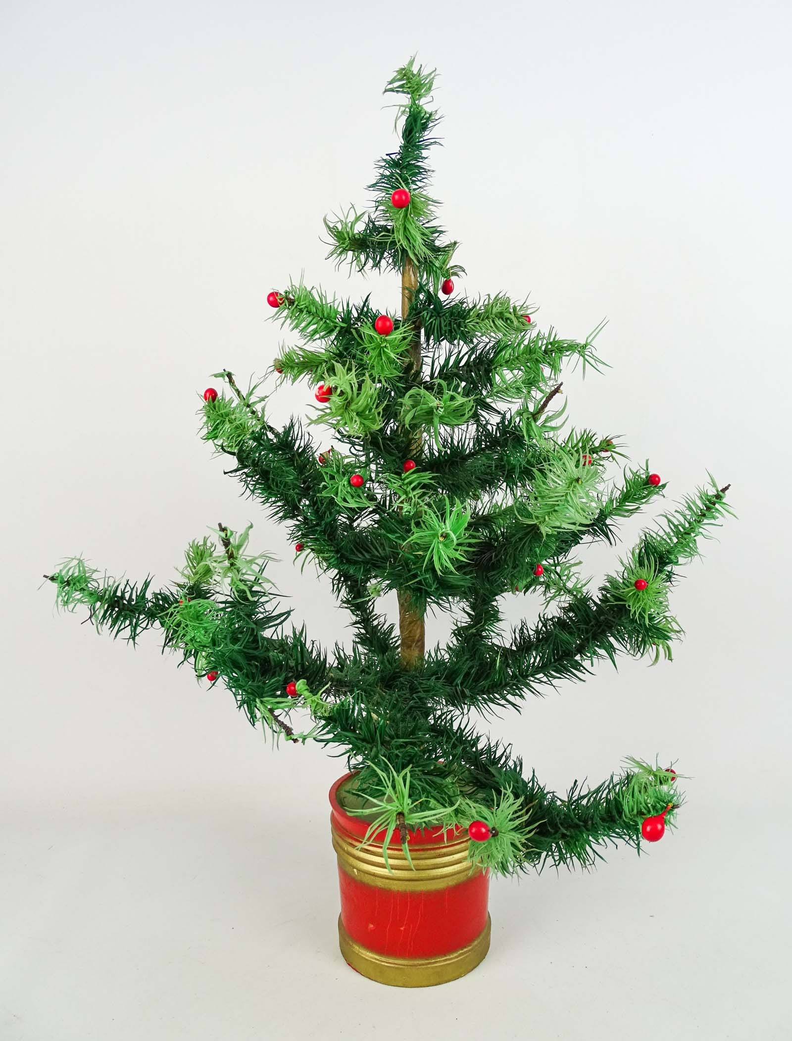 Feather Tree: Feather tree. Approx. 14" W., 22" Ht..