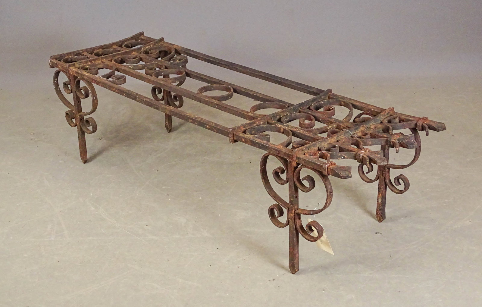 Wrought Iron Base: Wrought iron base. 57" x 17" x 14".
