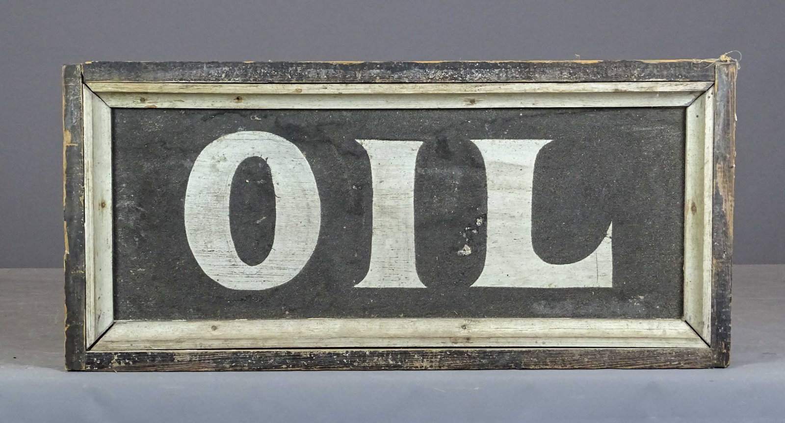 Trade Sign: Sand painted wooden trade sign "OIL". 24" x 11".