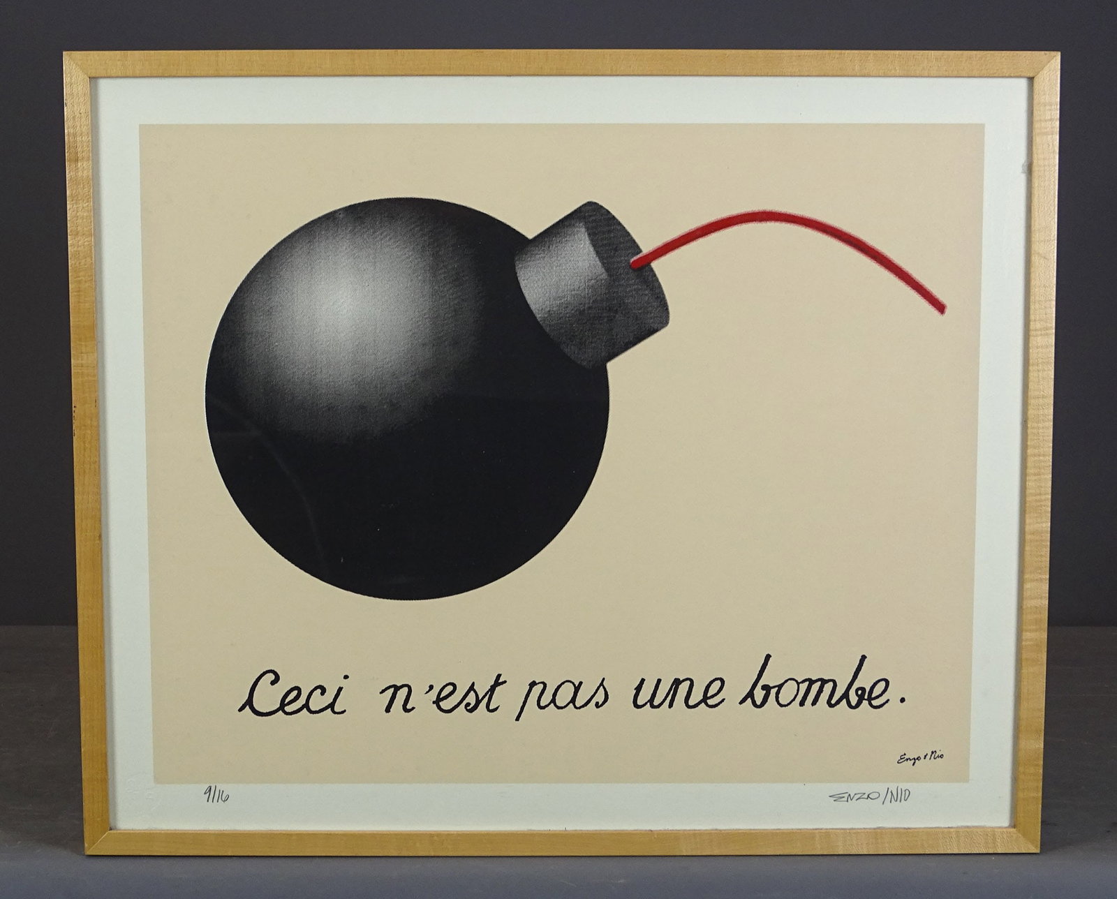 Enzo Nio (20th Century): Enzo Nio (20th Century), "Ceci n' est nas une bombe". Signed and numbered lithograph. Overall in frame 19 1/2" x 23 1/2".