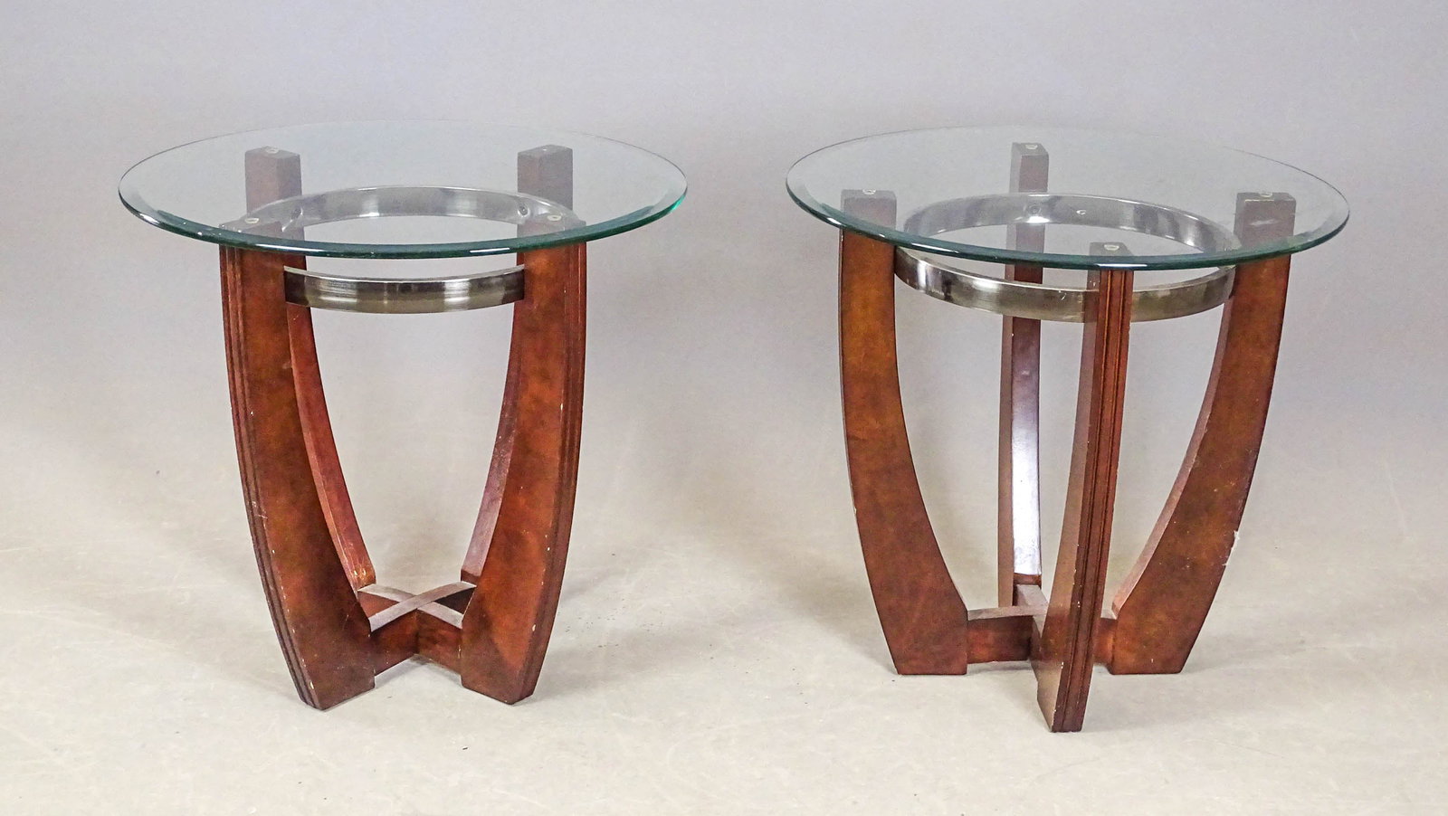 Pair Modern Design Side Tables: Pair Modern design glass top side tables. 25" D., 24" Ht..