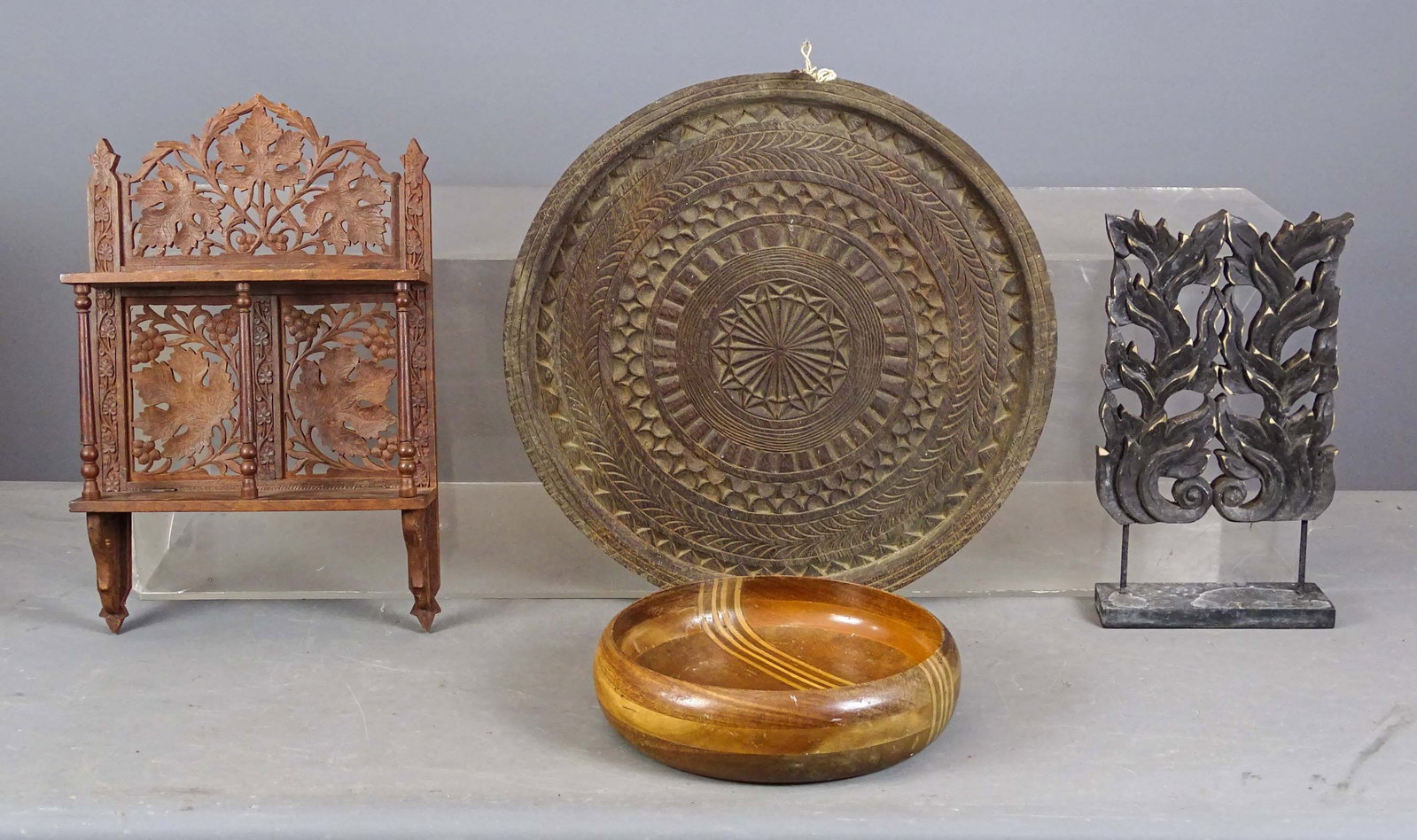 Woodenware & Misc. Lot: Lot including: Carved wooden plate (17" D.), wooden bowl (10" D.), carved element on stand (8" W., 14" Ht.), carved folding shelf (11" W., 17" Ht.).