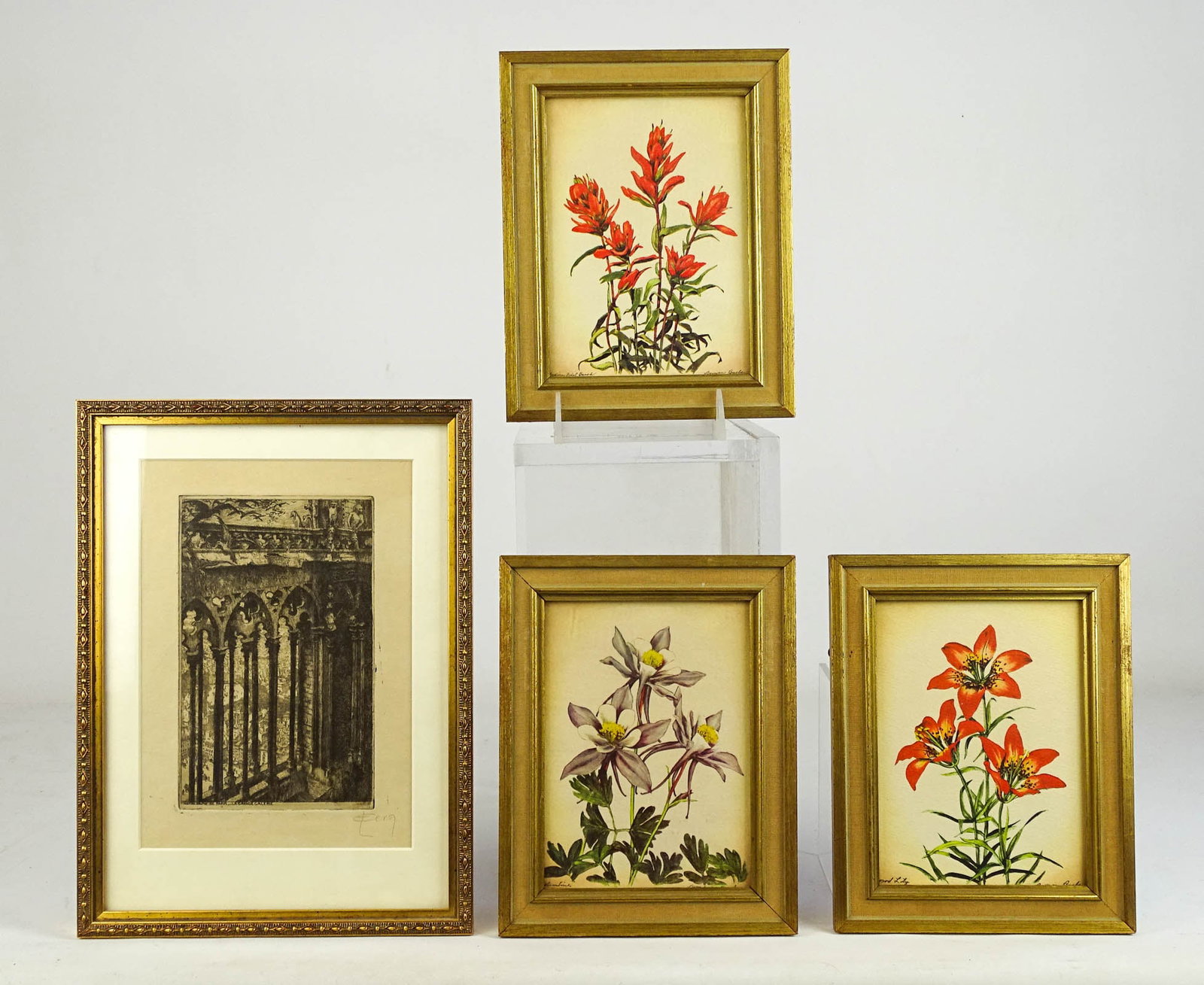 Artwork Lot: Artwork lot including: (3) framed floral prints (overall 8 1/2" 6 1/2"), and early etching marked "NOTRE DAME DE PARIS LE GRAND GALERIE" (pencil signed, overall 12" x 8 1/2".