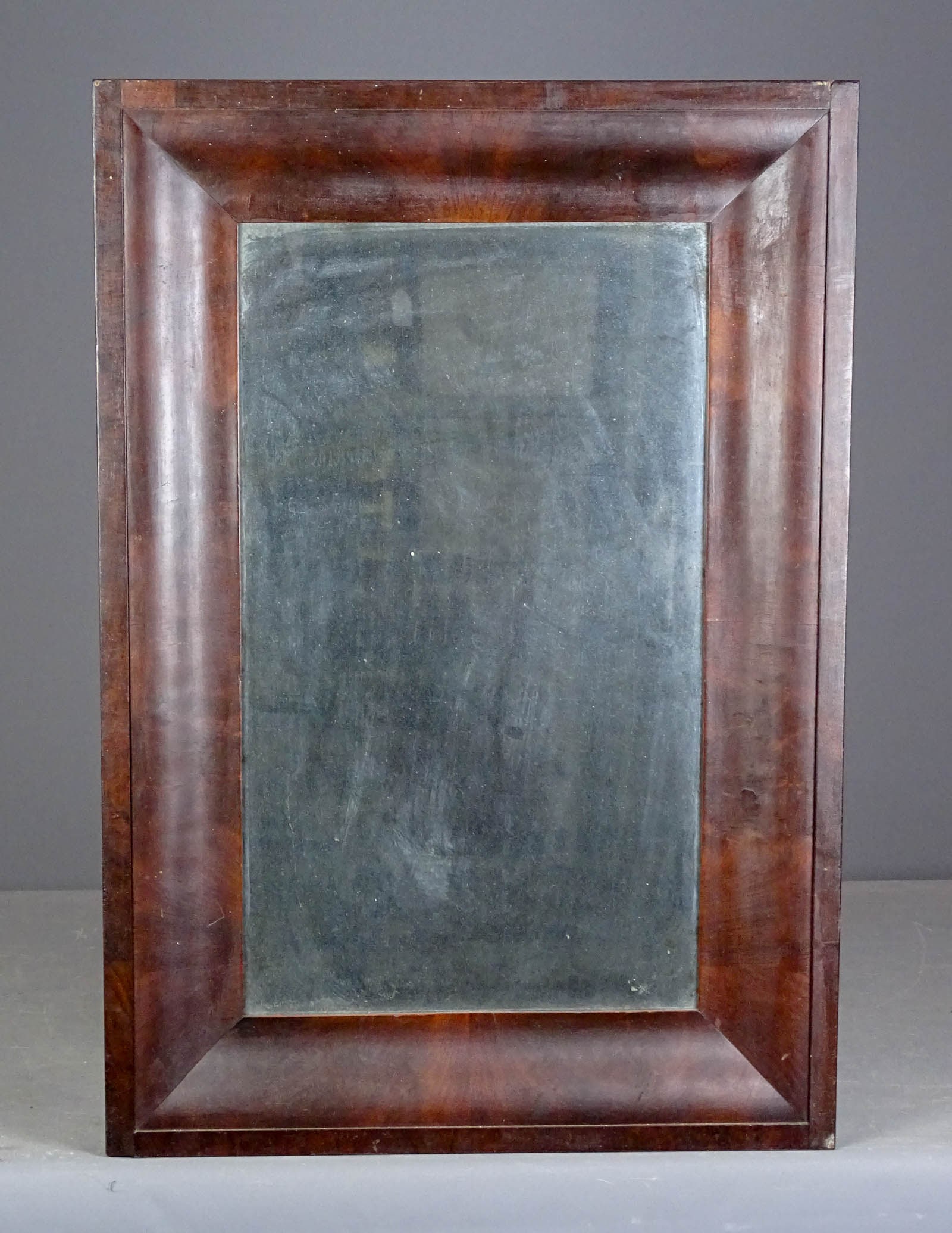19th c. Labeled Mass. Mirror: 19th c. labeled Mass. Mahogany mirror. 29" x 20". Labeled Banrcoft's.