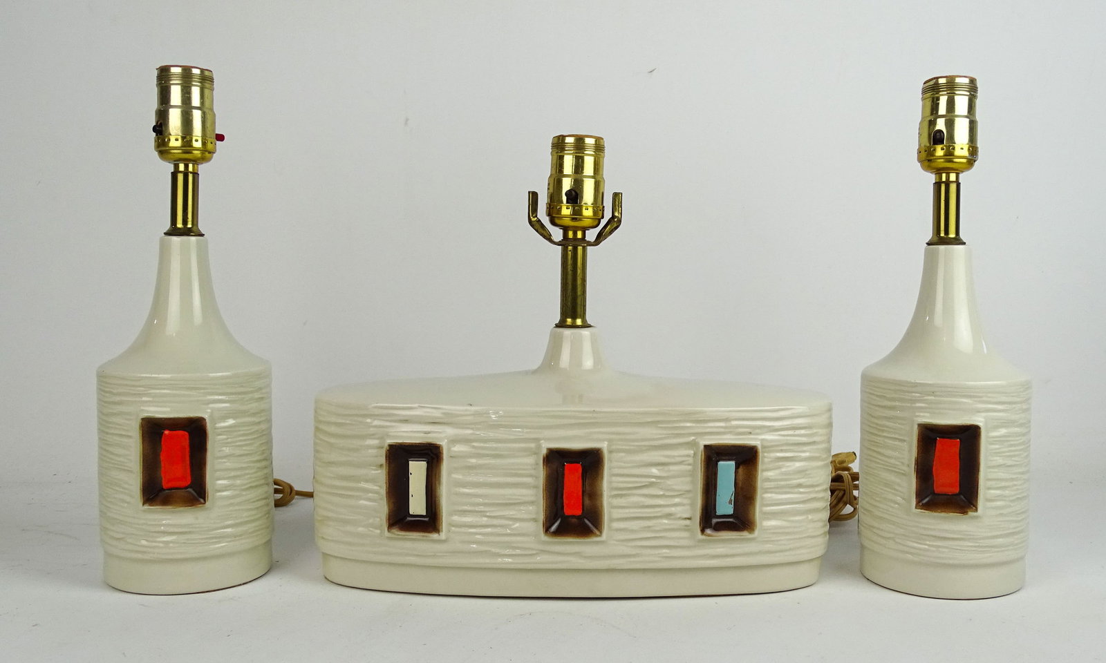 Vintage Lamp Set: Vintage three piece ceramic lamp set. 13" W., 11" Ht., (2) 12" Ht..