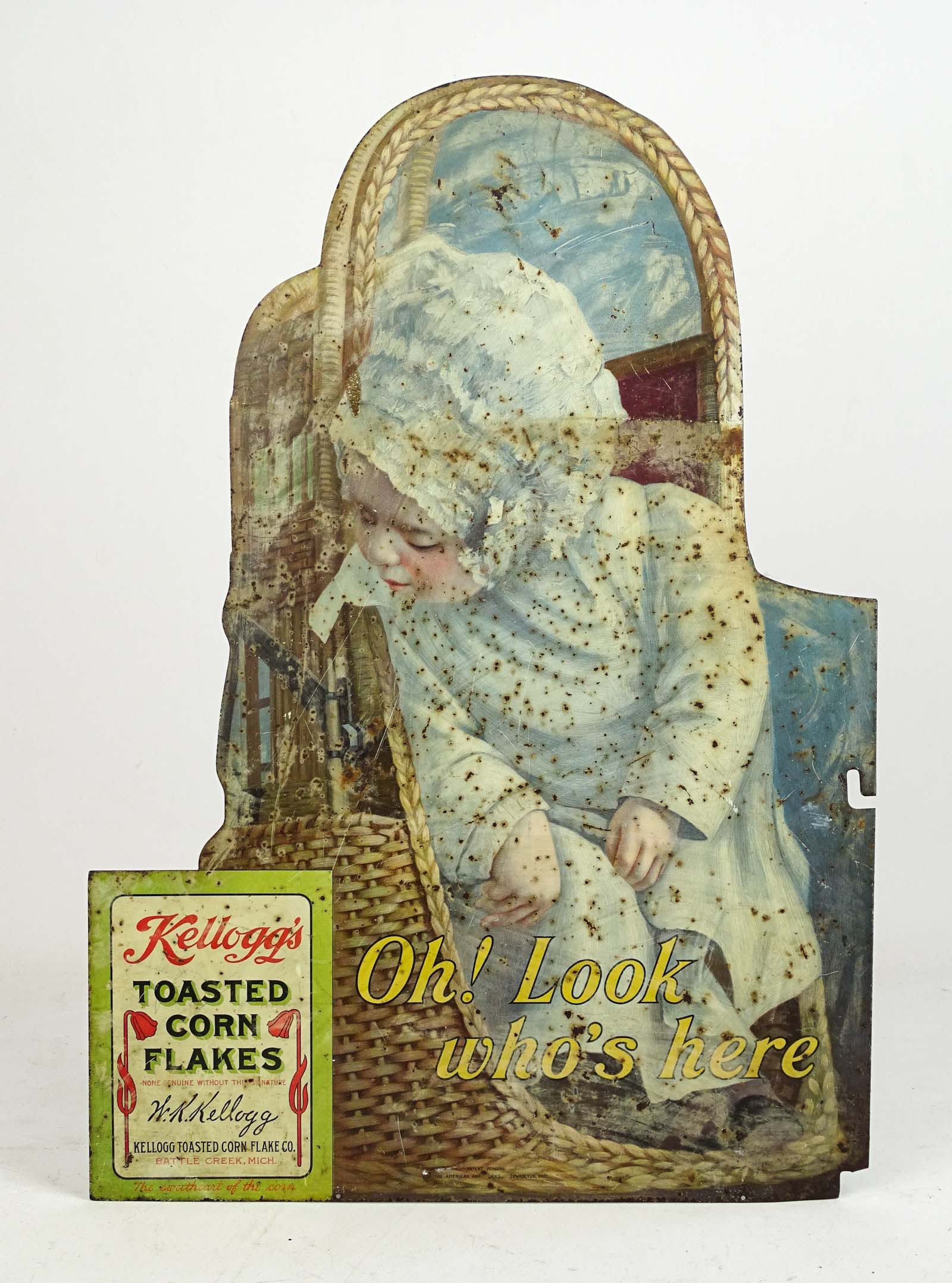 Kellogg's Sign: 1910 Kellogg's Toasted Corn Flakes metal two sided advertising sign. 13 1/2" x 19 1/4".