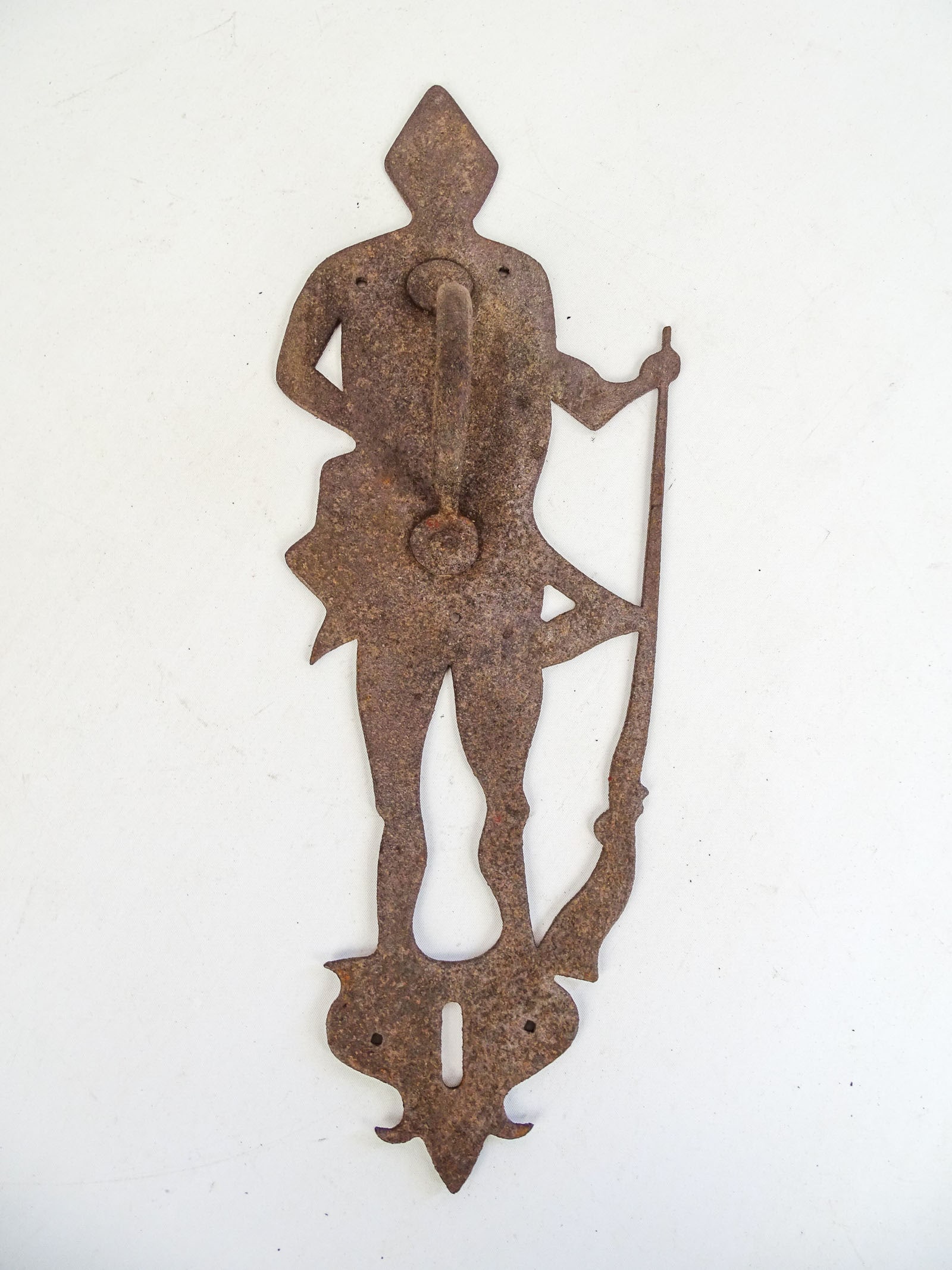 Figural Door Handle: Iron figure with gun door handle. 16" L..