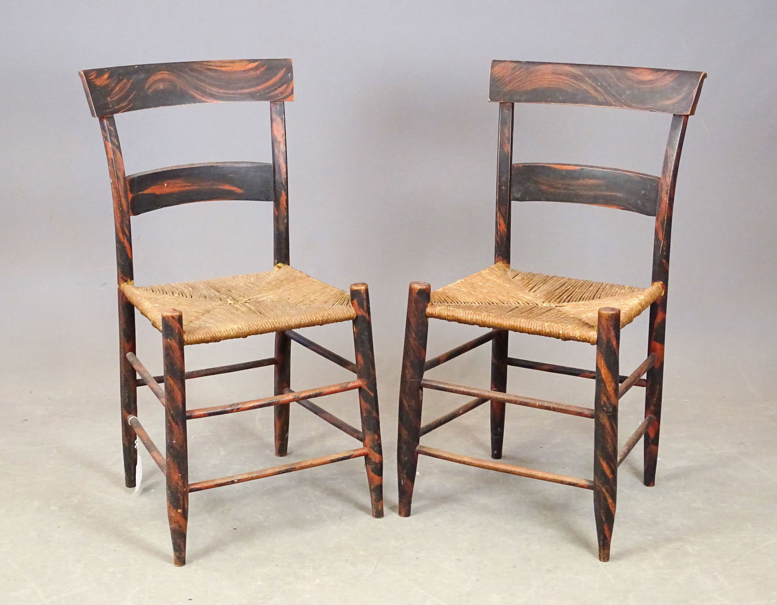 Pair of Rush Seat Chairs: Pair of early 19th c. faux grain painted rush seat chairs. 17" seat Ht., 34" overall Ht..