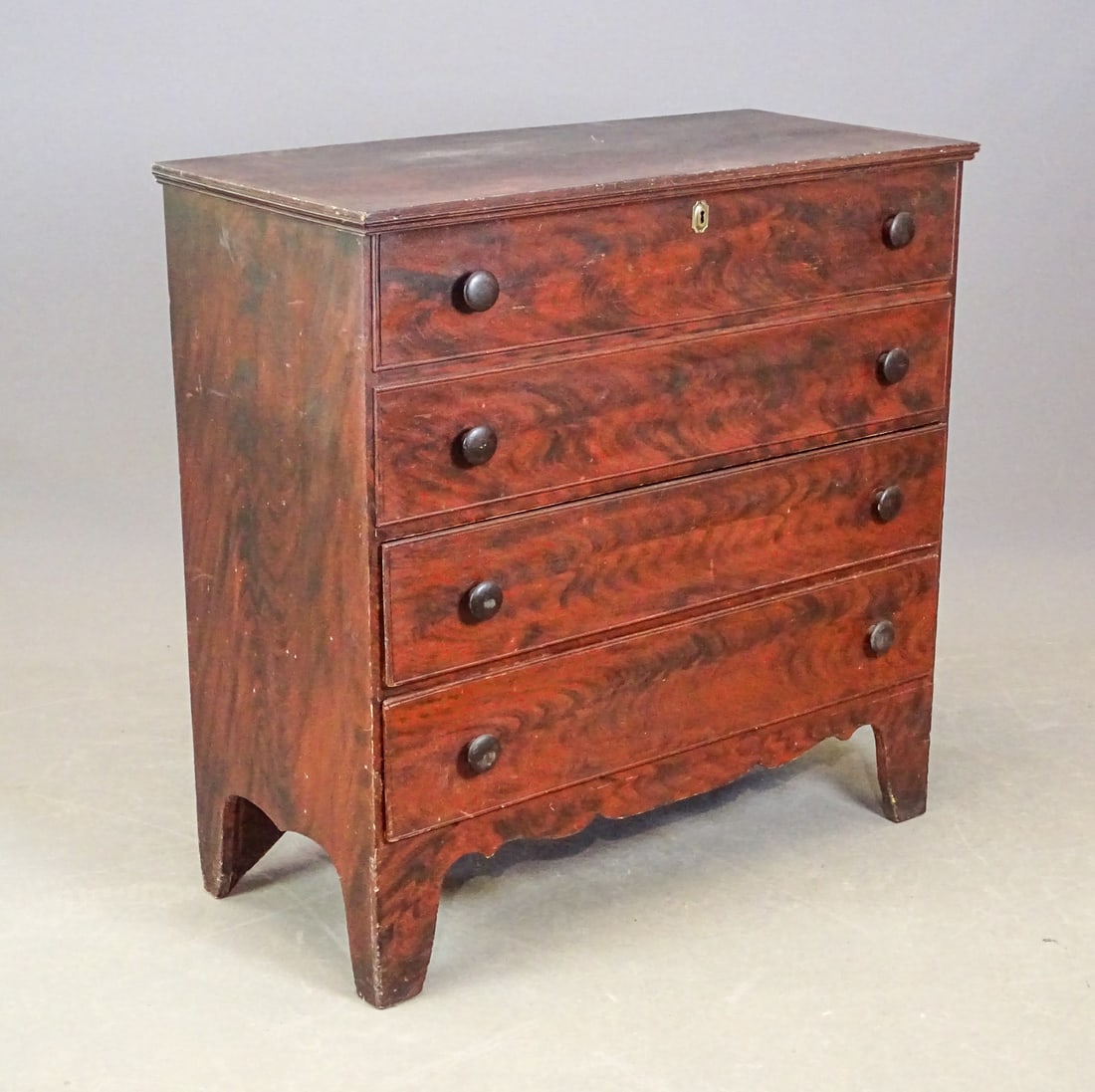 19th c. Blanket Chest: 19th c. faux grain painted lift top two drawer blanket chest with shaped apron. 41" x 19" x 40 1/2".