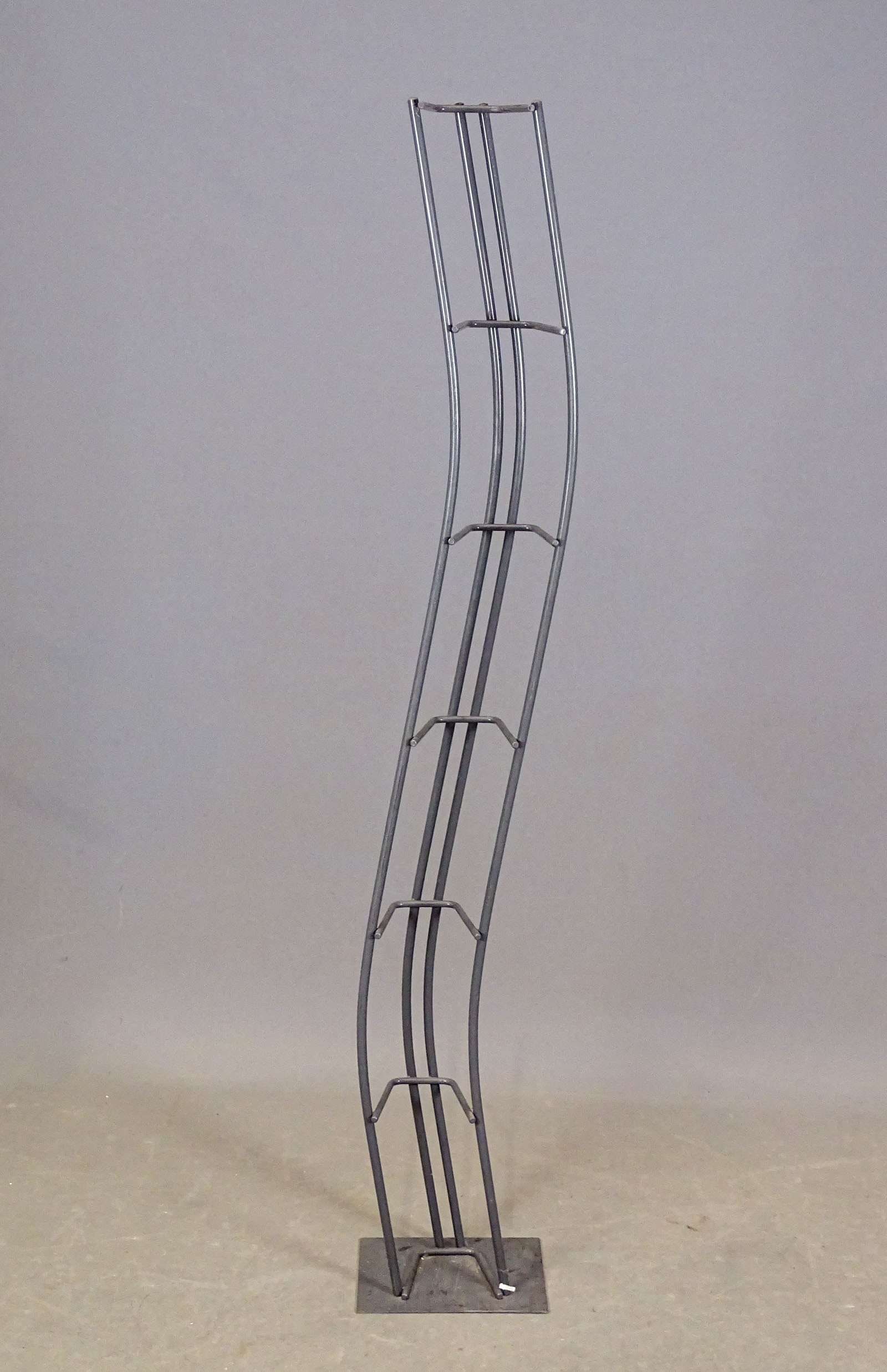 Wrought Iron CD Rack: Wrought iron CD rack. 61 1/2" Ht..