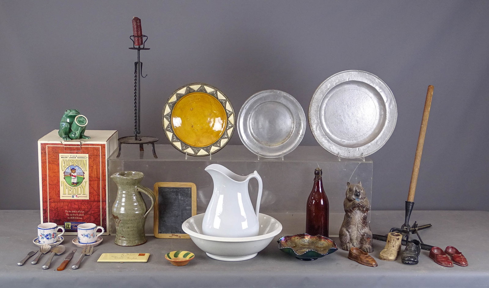 Misc. Lot: Misc. lot including unusual tool (11" x 27"), iron lighting device (19" Ht.), Carnival glass dish (8" D.), pewter plates (10" and 13" D.), bottle, pottery pitcher (10 1/2" Ht.), ironstone pitcher and 