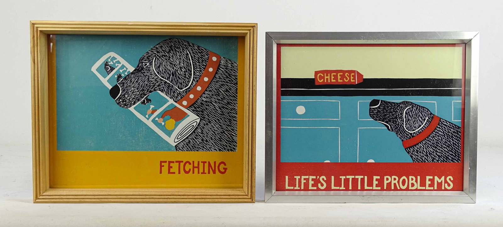Stephen Huneck Prints: Pair of framed Stephen Huneck prints "FETCHING" and "LIFE'S LITTLE PROBLEMS" (9" x 11").