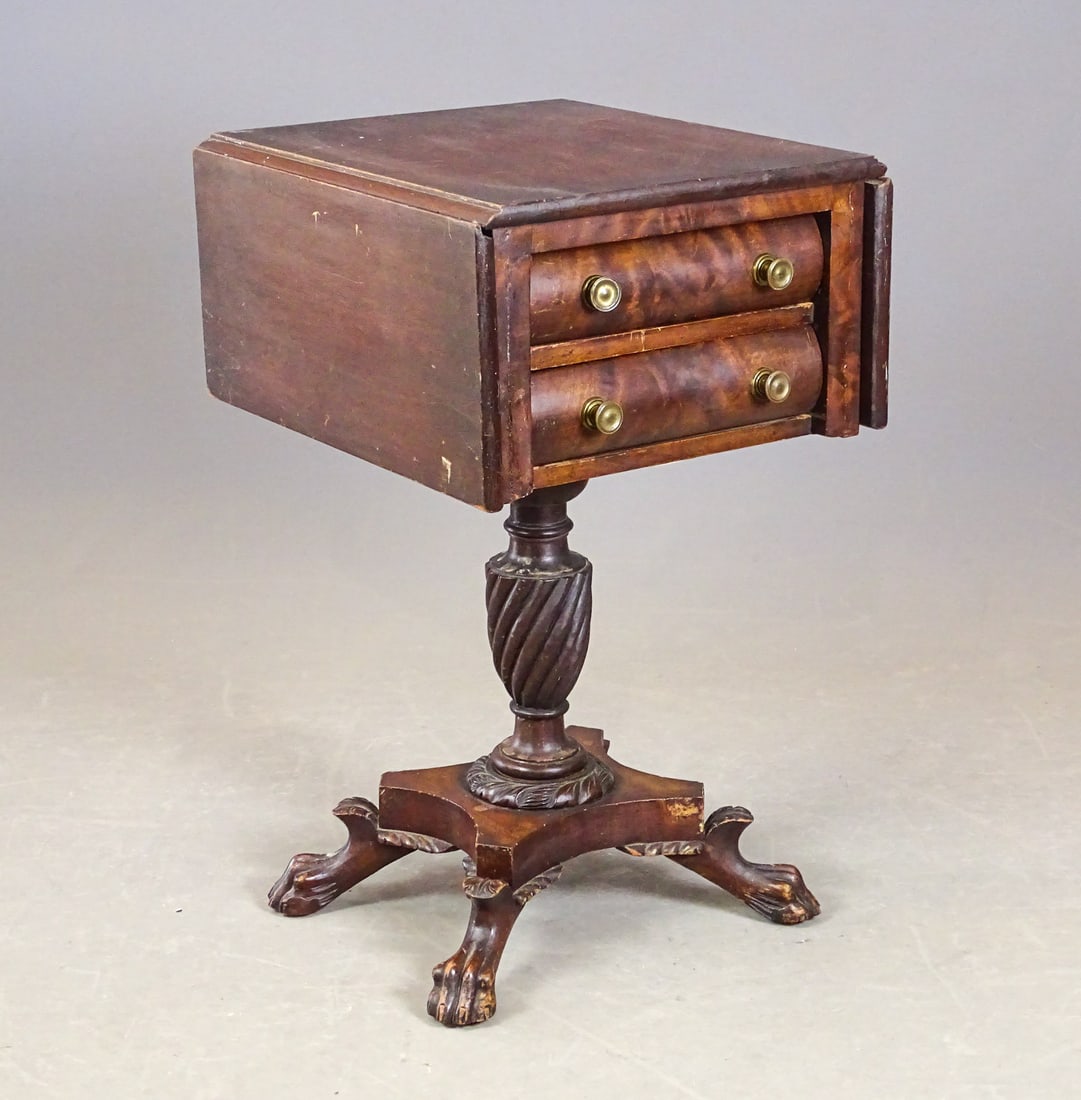 19th c. Dropleaf Table: 19th c. Empire two drawer dropleaf table with carved paw feet. 16" x 18" with 9" leaves, 28" Ht..